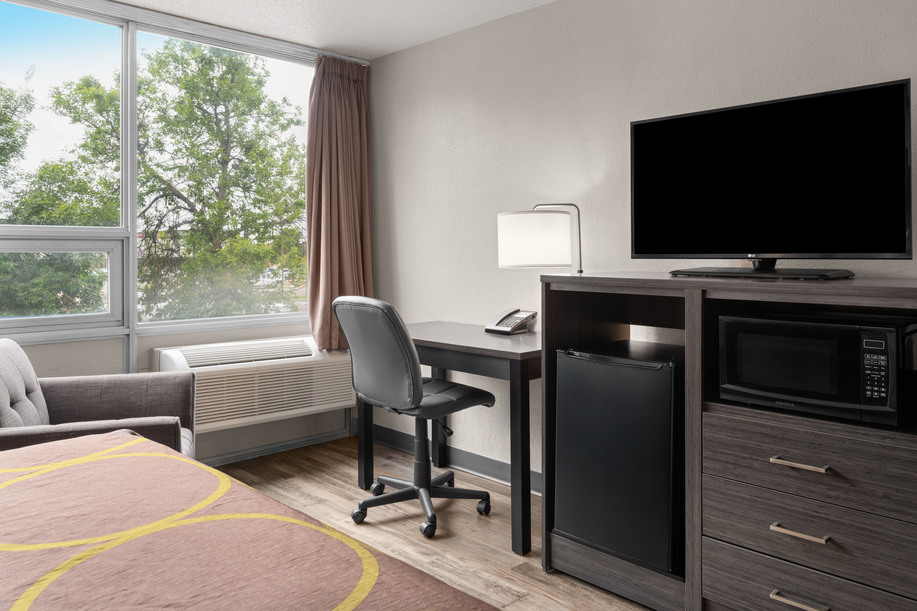 Guest room at the Super 8 by Wyndham Great Falls City Center in Great Falls, Montana
