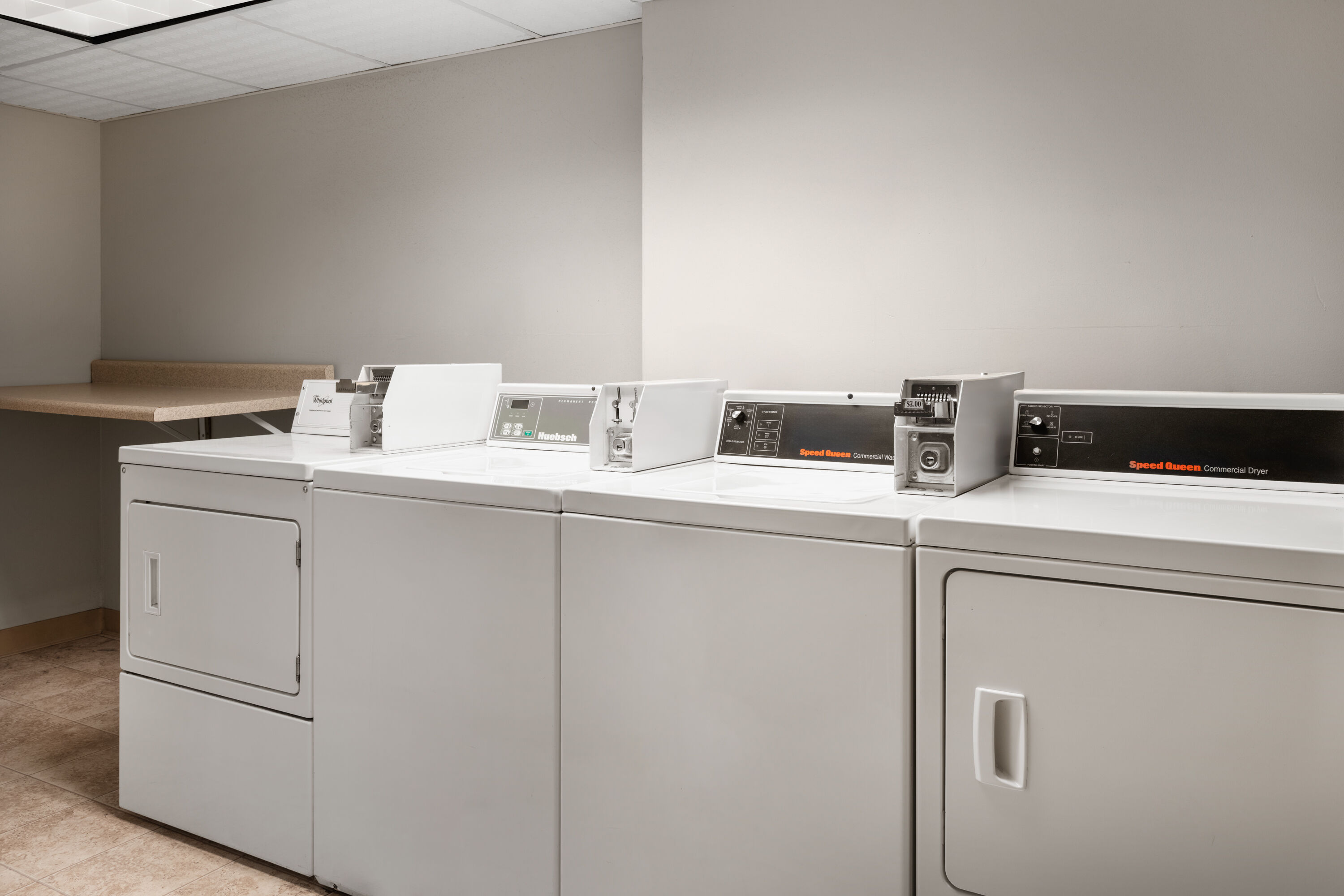 Laundry facilities at Super 8 by Wyndham Great Falls City Center in Great Falls, Montana
