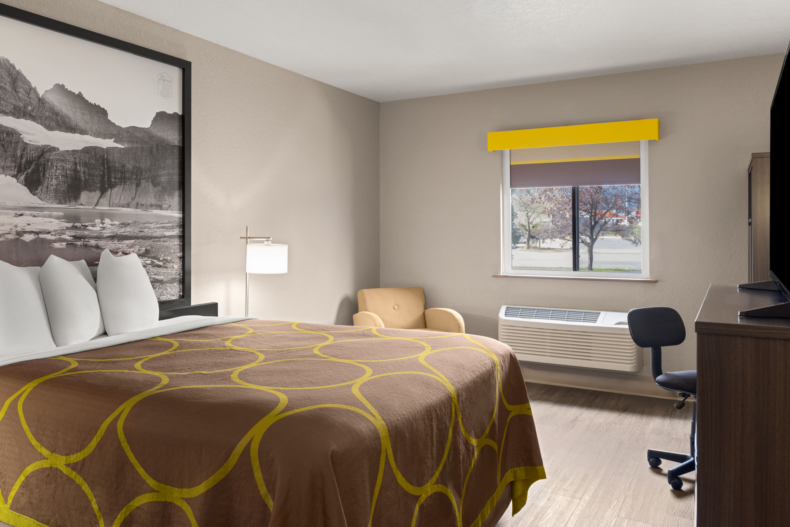 Guest room at the Super 8 by Wyndham Kalispell Glacier National Park in Kalispell, Montana
