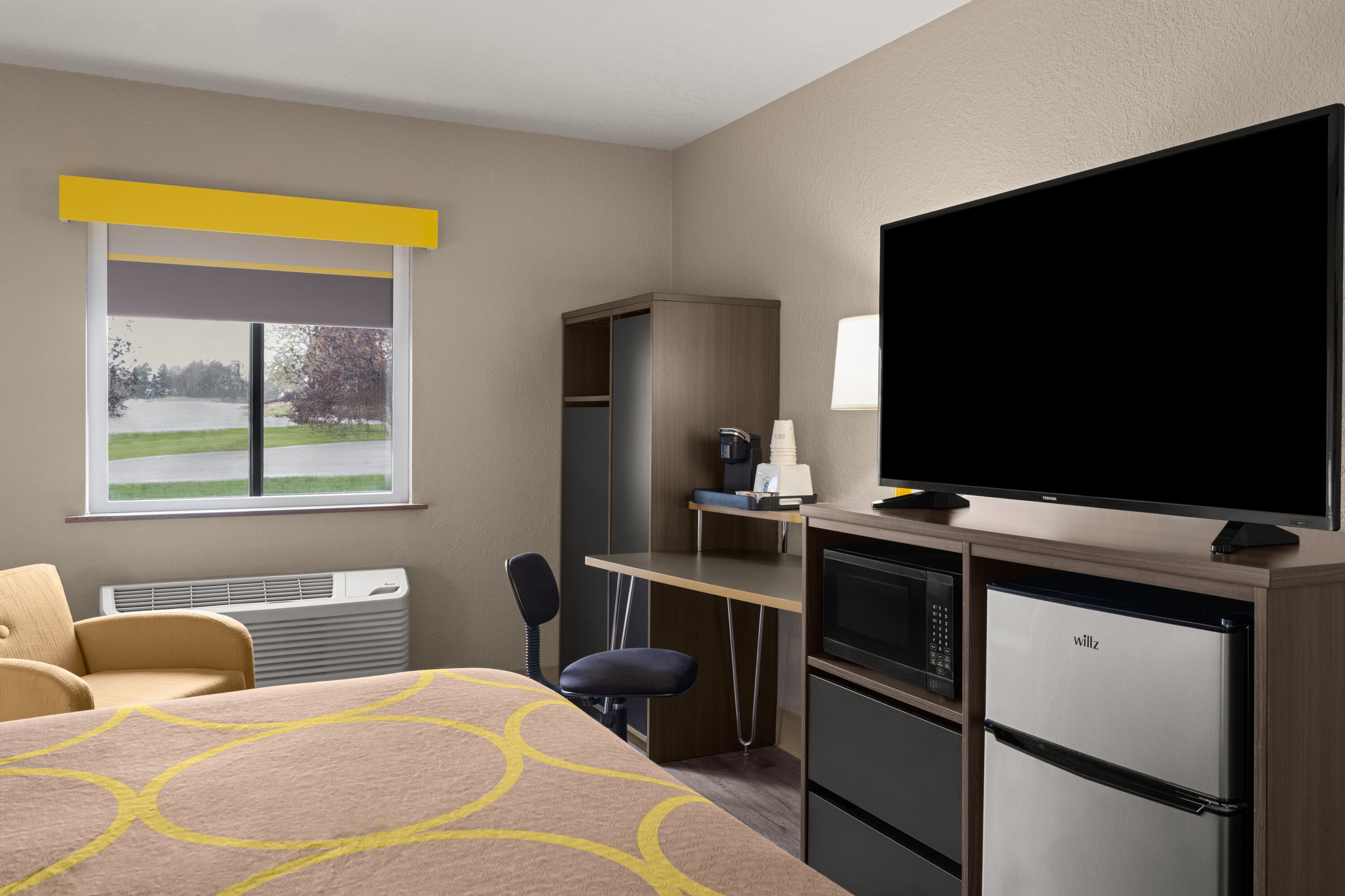 Guest room at the Super 8 by Wyndham Kalispell Glacier National Park in Kalispell, Montana