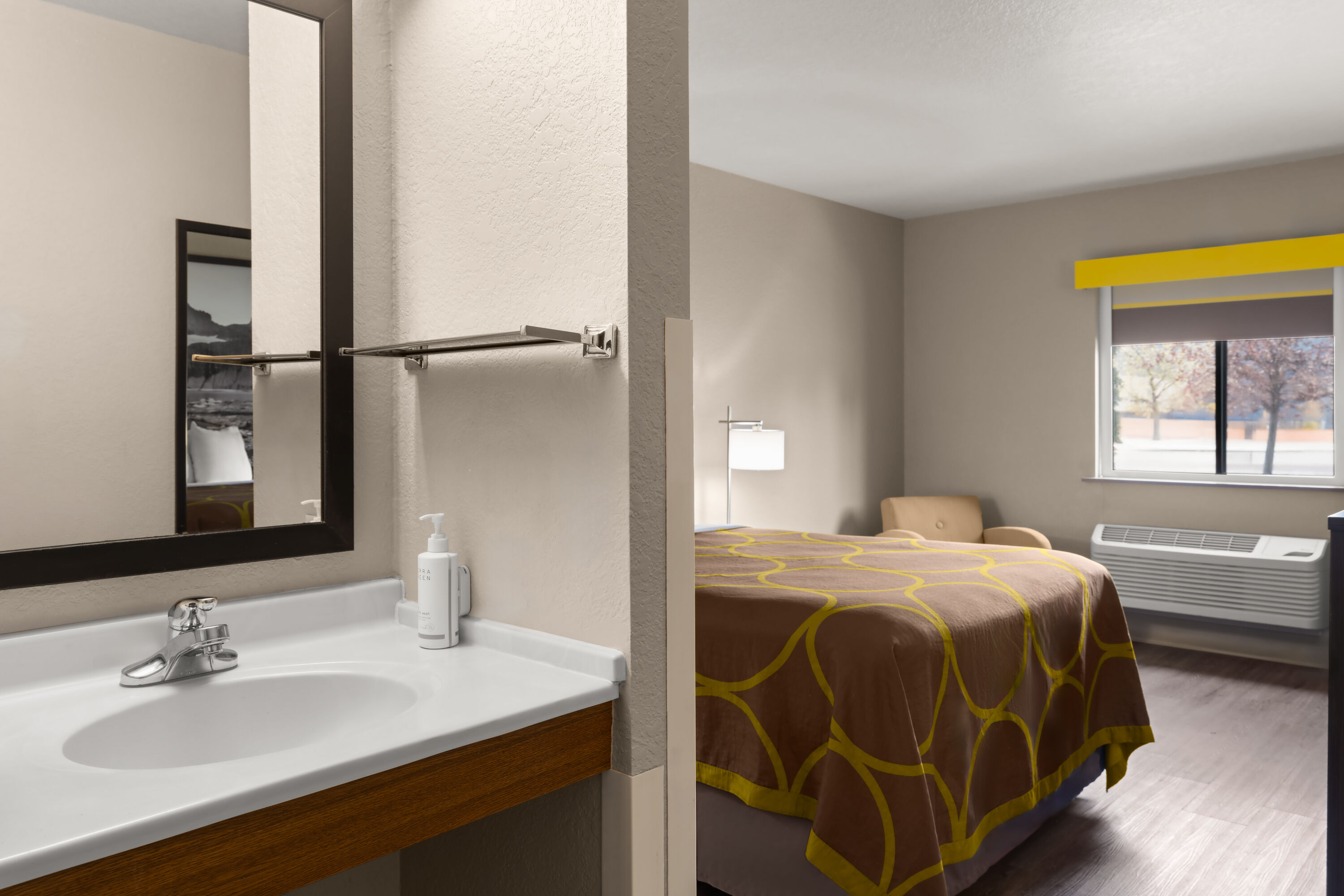 Guest room at the Super 8 by Wyndham Kalispell Glacier National Park in Kalispell, Montana