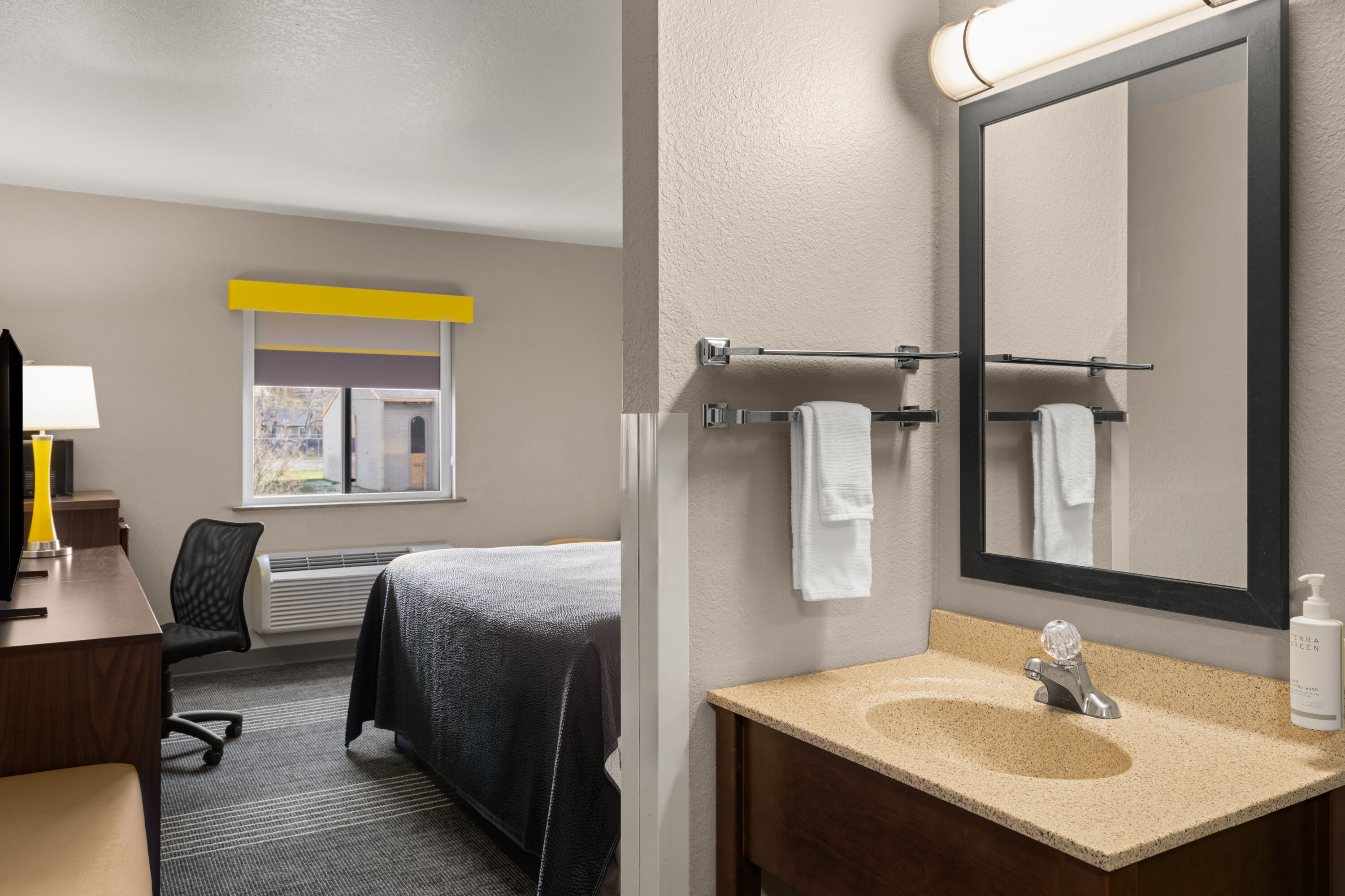 Guest room at the Super 8 by Wyndham Kalispell Glacier National Park in Kalispell, Montana