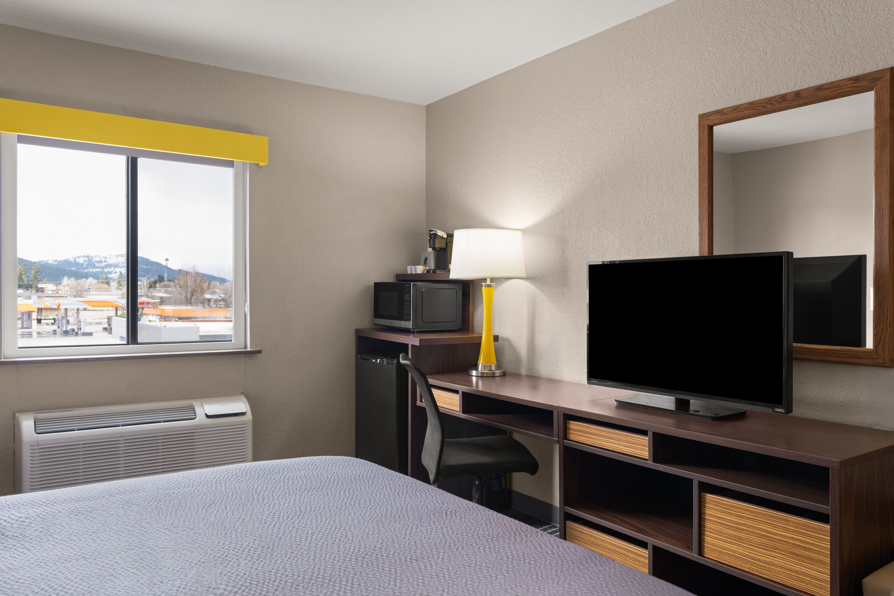 Guest room at the Super 8 by Wyndham Kalispell Glacier National Park in Kalispell, Montana