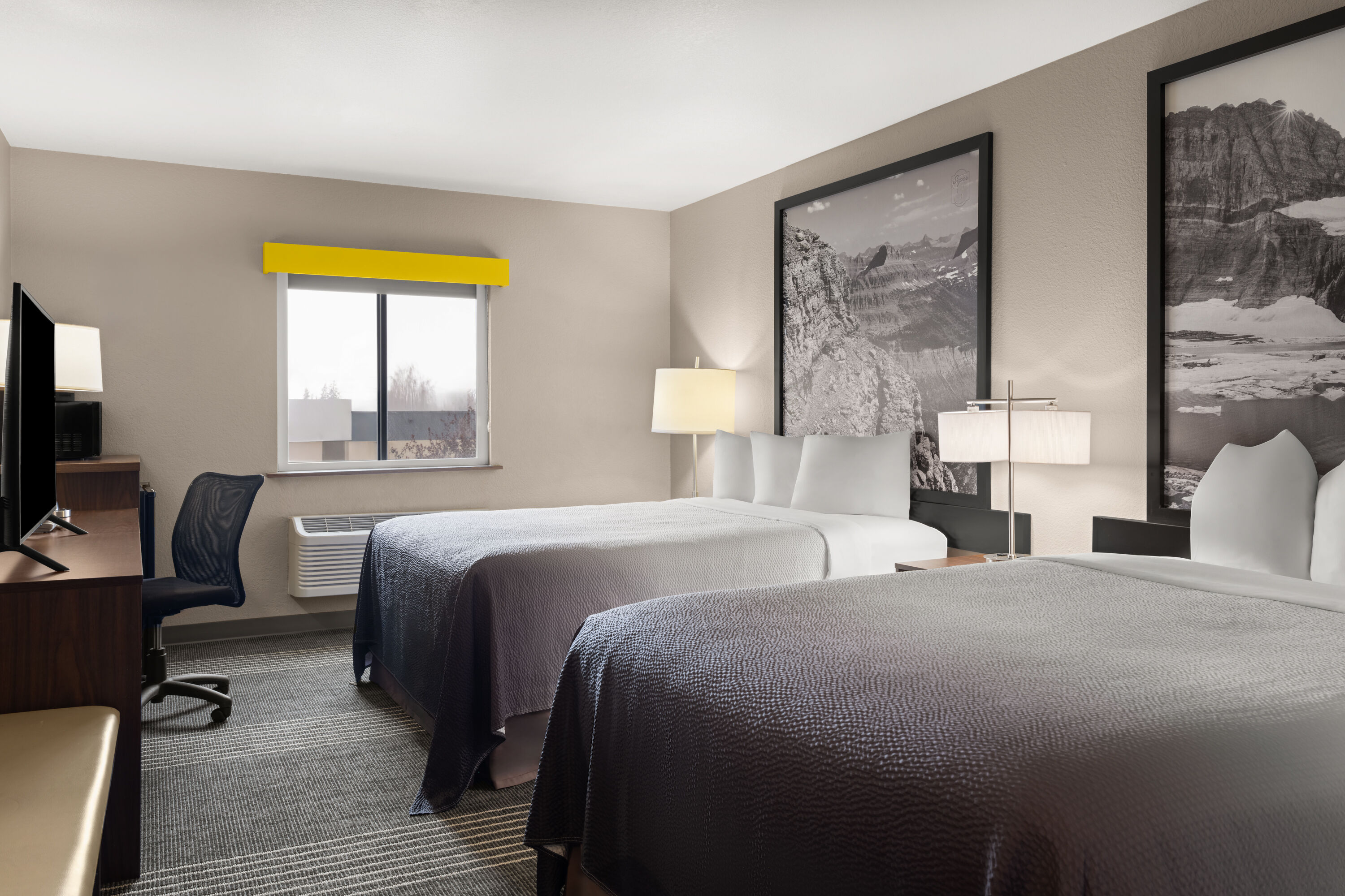 Guest room at the Super 8 by Wyndham Kalispell Glacier National Park in Kalispell, Montana