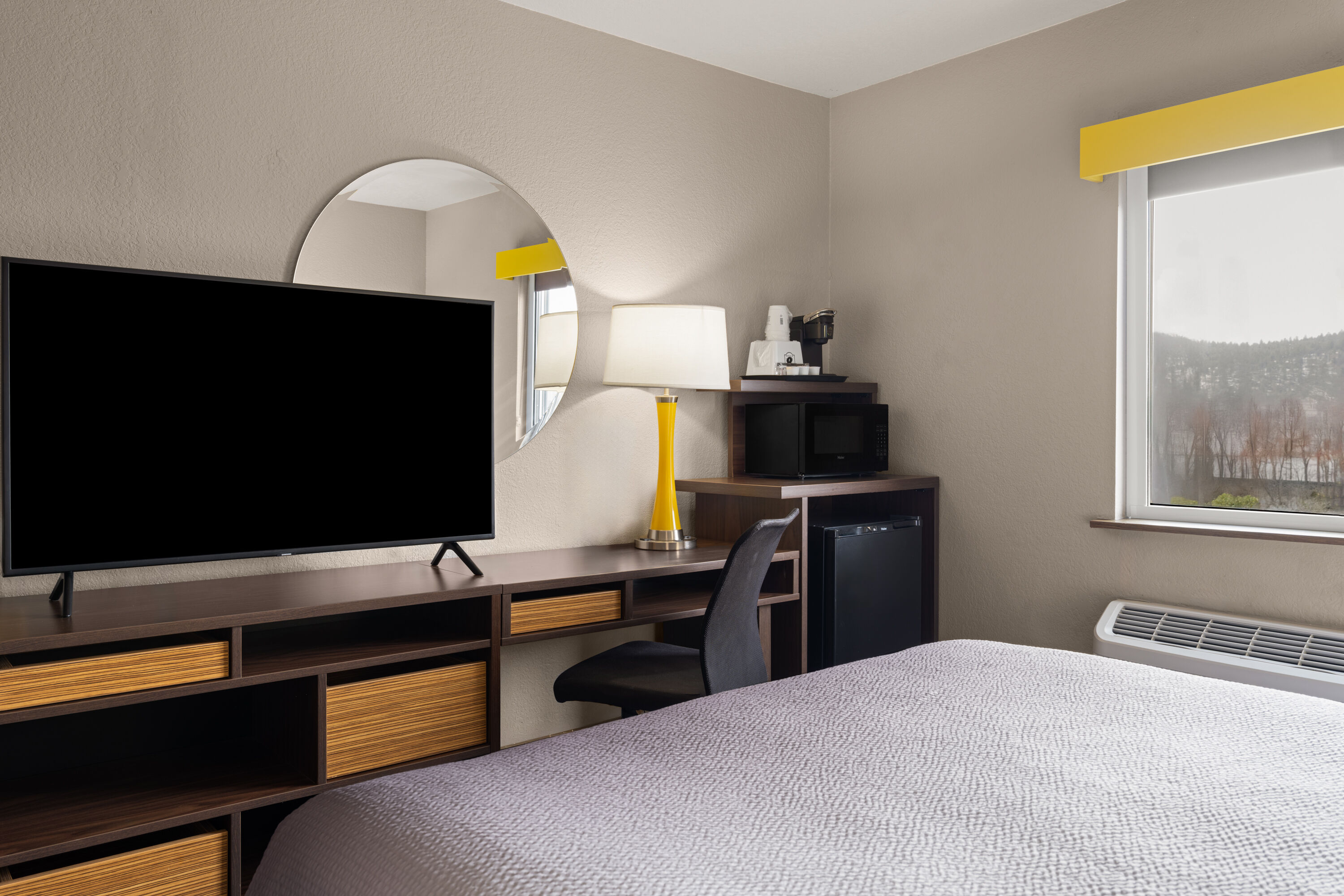 Guest room at the Super 8 by Wyndham Kalispell Glacier National Park in Kalispell, Montana