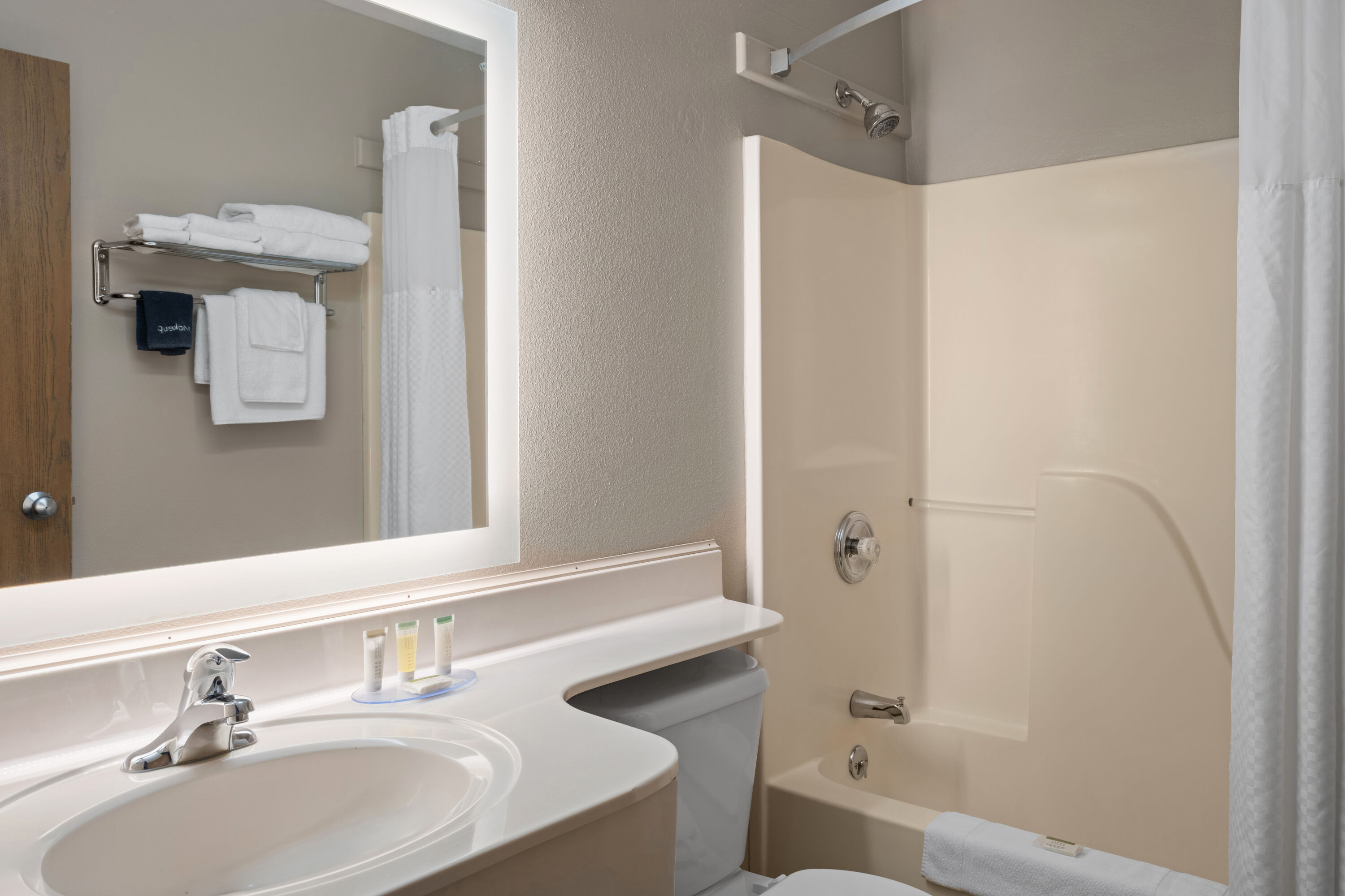 Guest room bath at the Super 8 by Wyndham Lewistown in Lewistown, Montana