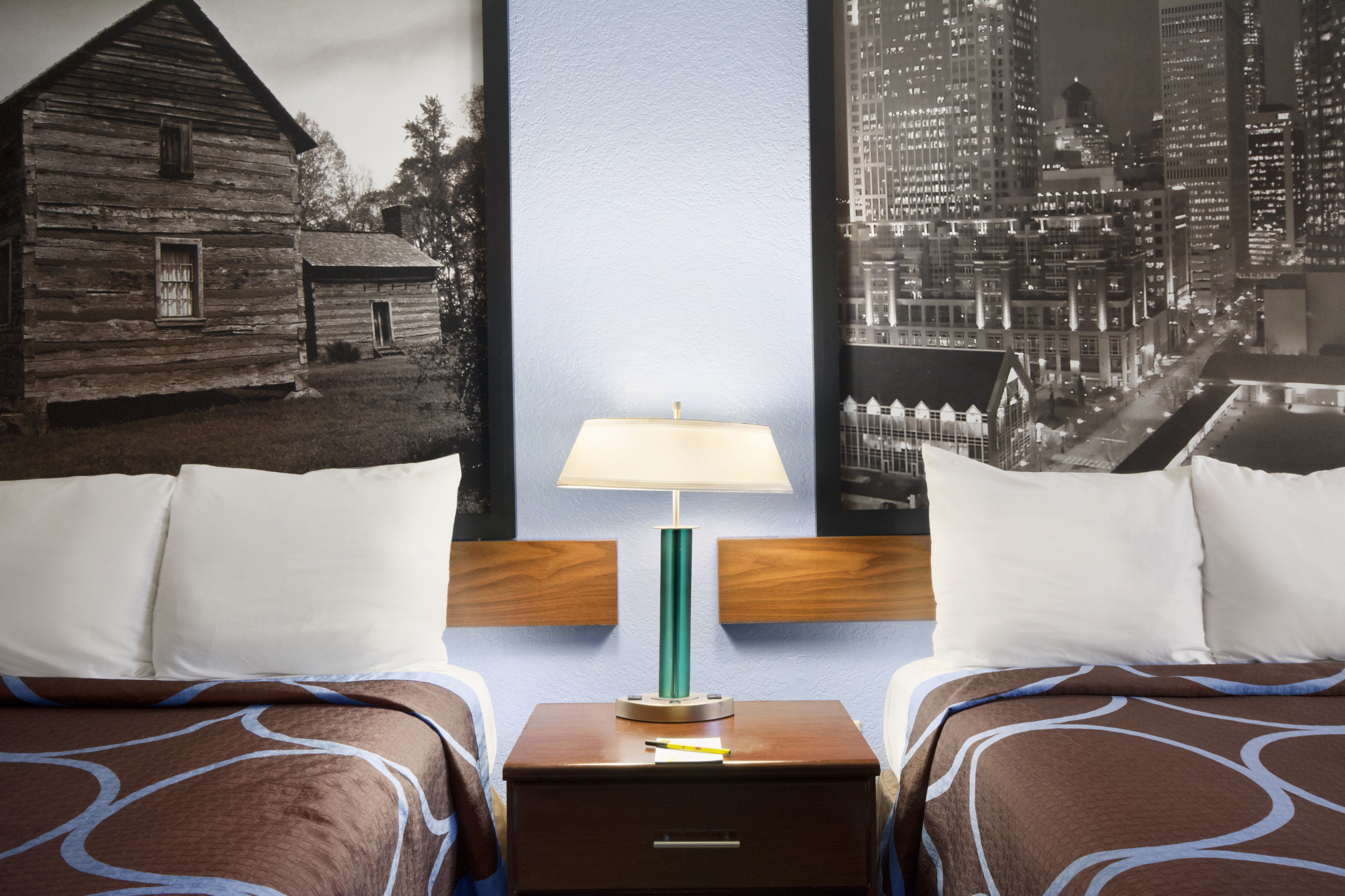 Guest room at the Super 8 by Wyndham Charlotte University in Charlotte, North Carolina