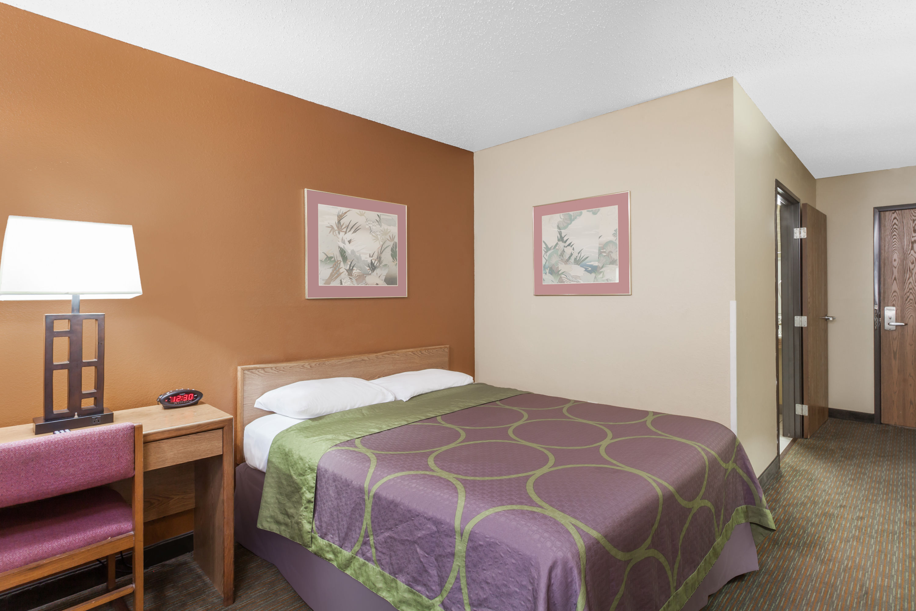 Guest room at the Super 8 by Wyndham Charlotte/Amusement Park Area in Charlotte, North Carolina