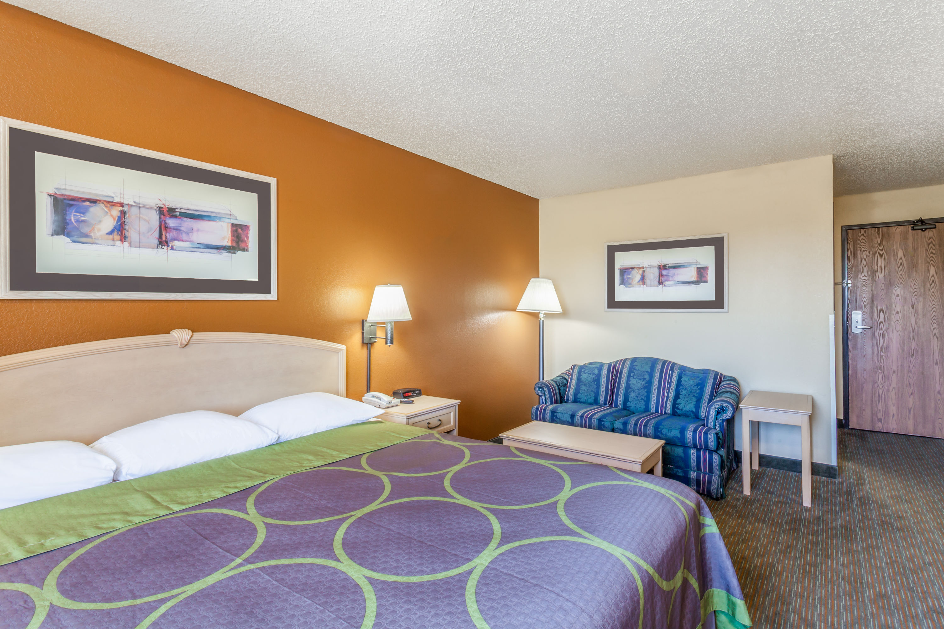 Guest room at the Super 8 by Wyndham Charlotte/Amusement Park Area in Charlotte, North Carolina