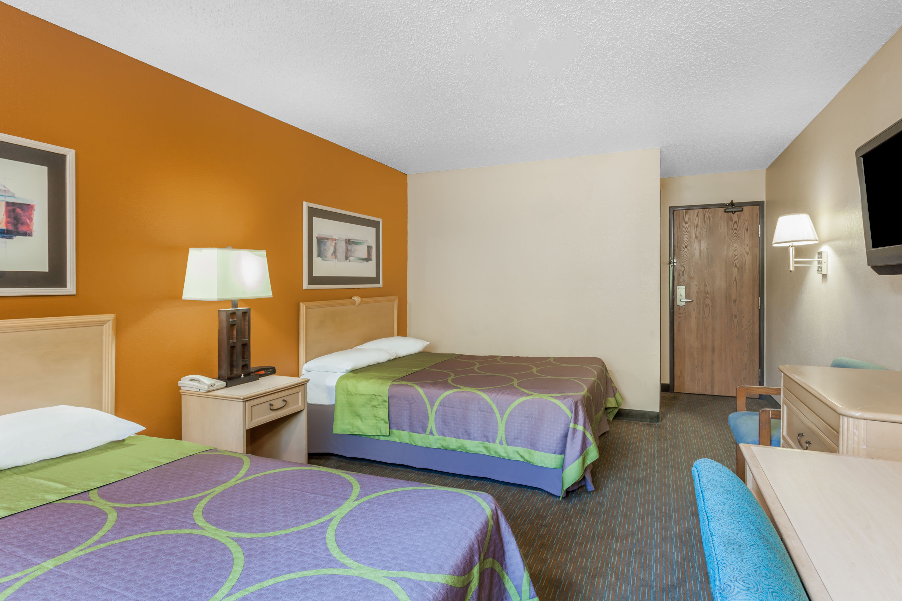 Guest room at the Super 8 by Wyndham Charlotte/Amusement Park Area in Charlotte, North Carolina