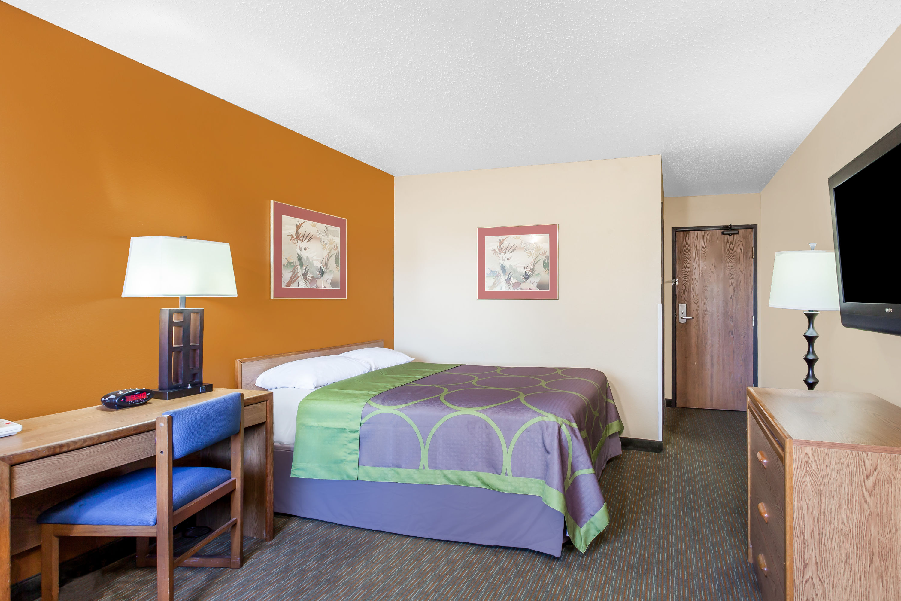 Guest room at the Super 8 by Wyndham Charlotte/Amusement Park Area in Charlotte, North Carolina