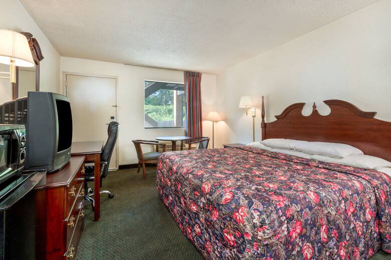 Guest room at the Super 8 Charlotte / Northlake in Charlotte, North Carolina