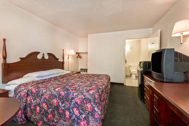 Guest room at the Super 8 Charlotte / Northlake in Charlotte, North Carolina