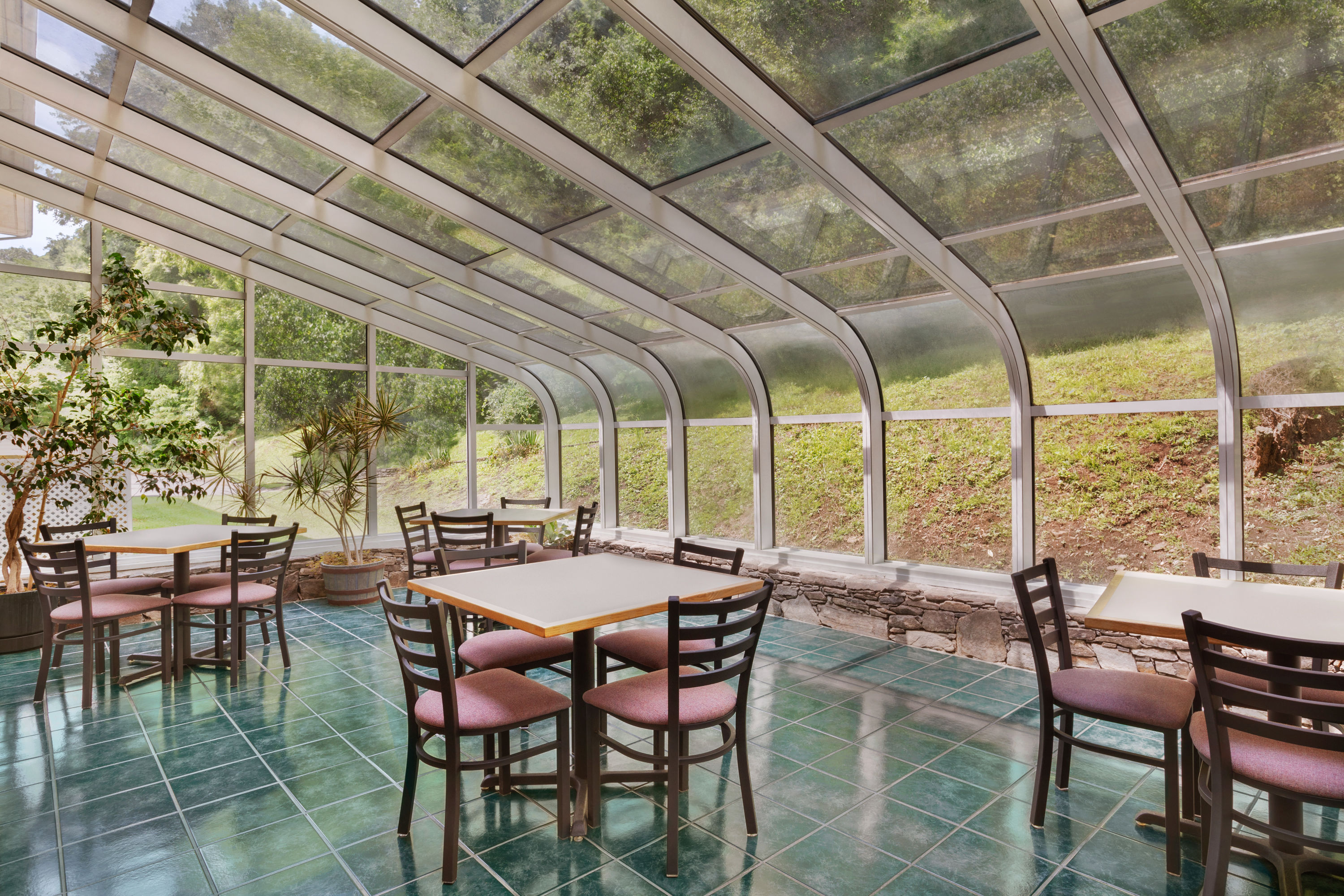 Super 8 by Wyndham Cherokee restaurant breakfast area with seating in Cherokee, North Carolina