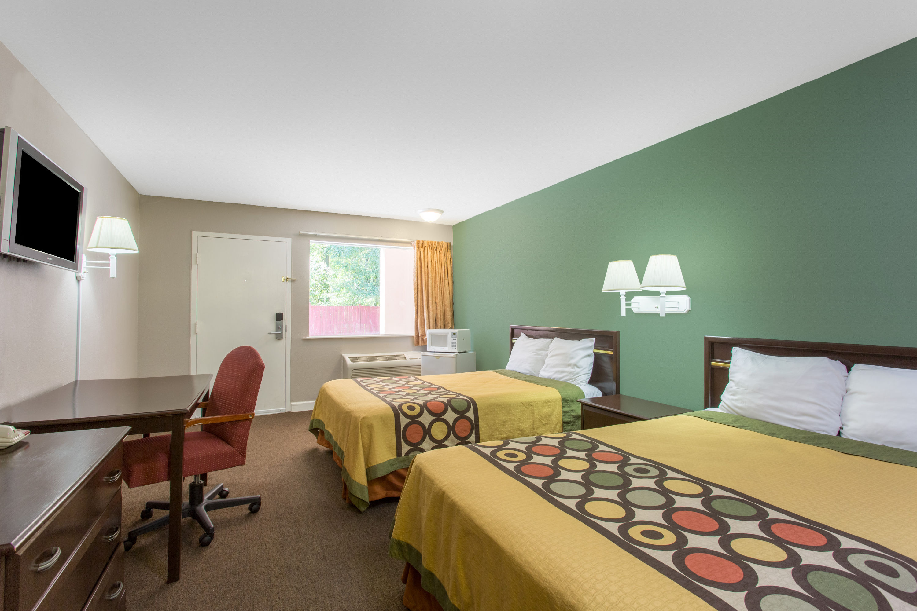 Guest room at the Super 8 by Wyndham Durham/University Area NC in Durham, North Carolina