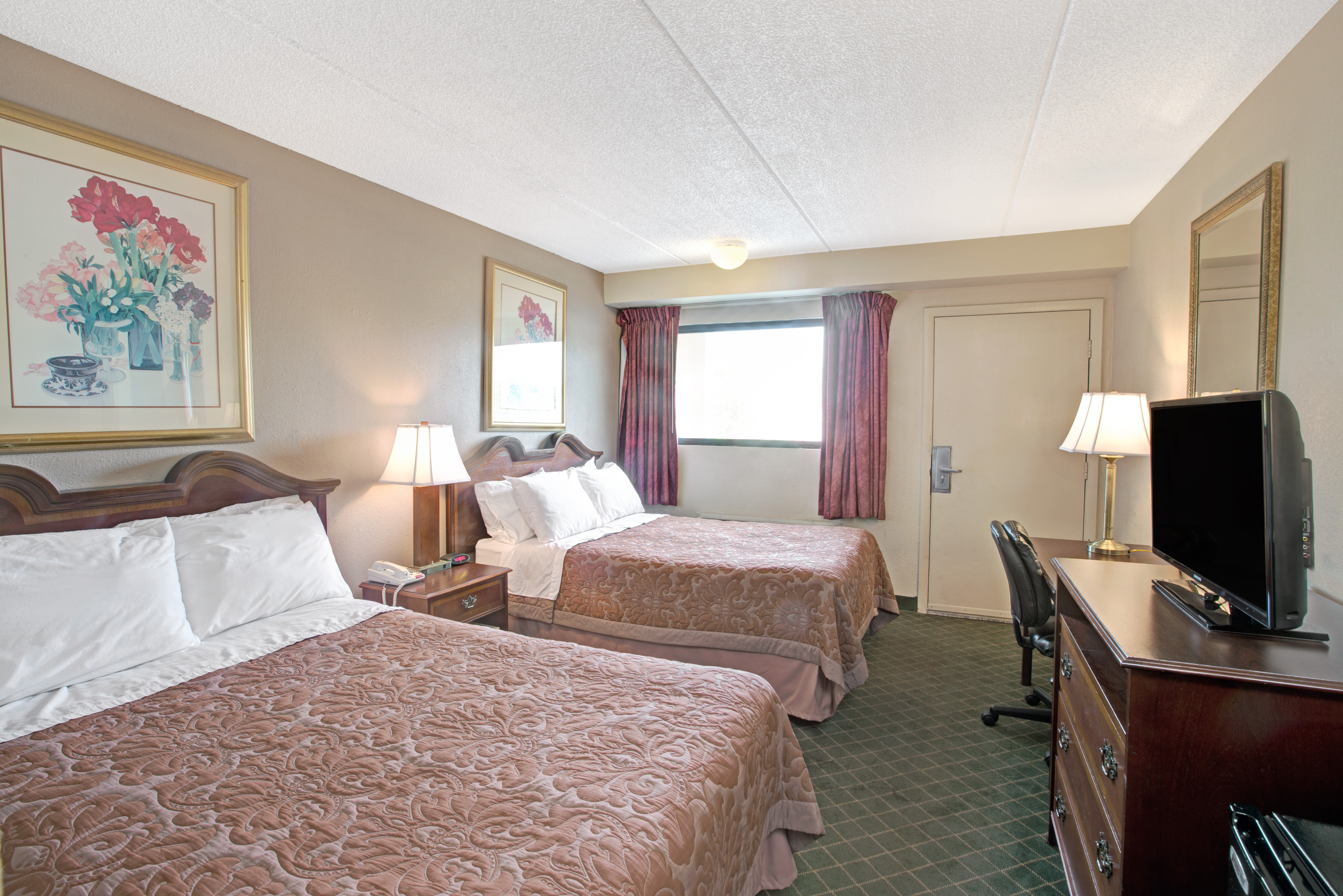 Guest room at the Super 8 by Wyndham Shelby in Shelby, North Carolina