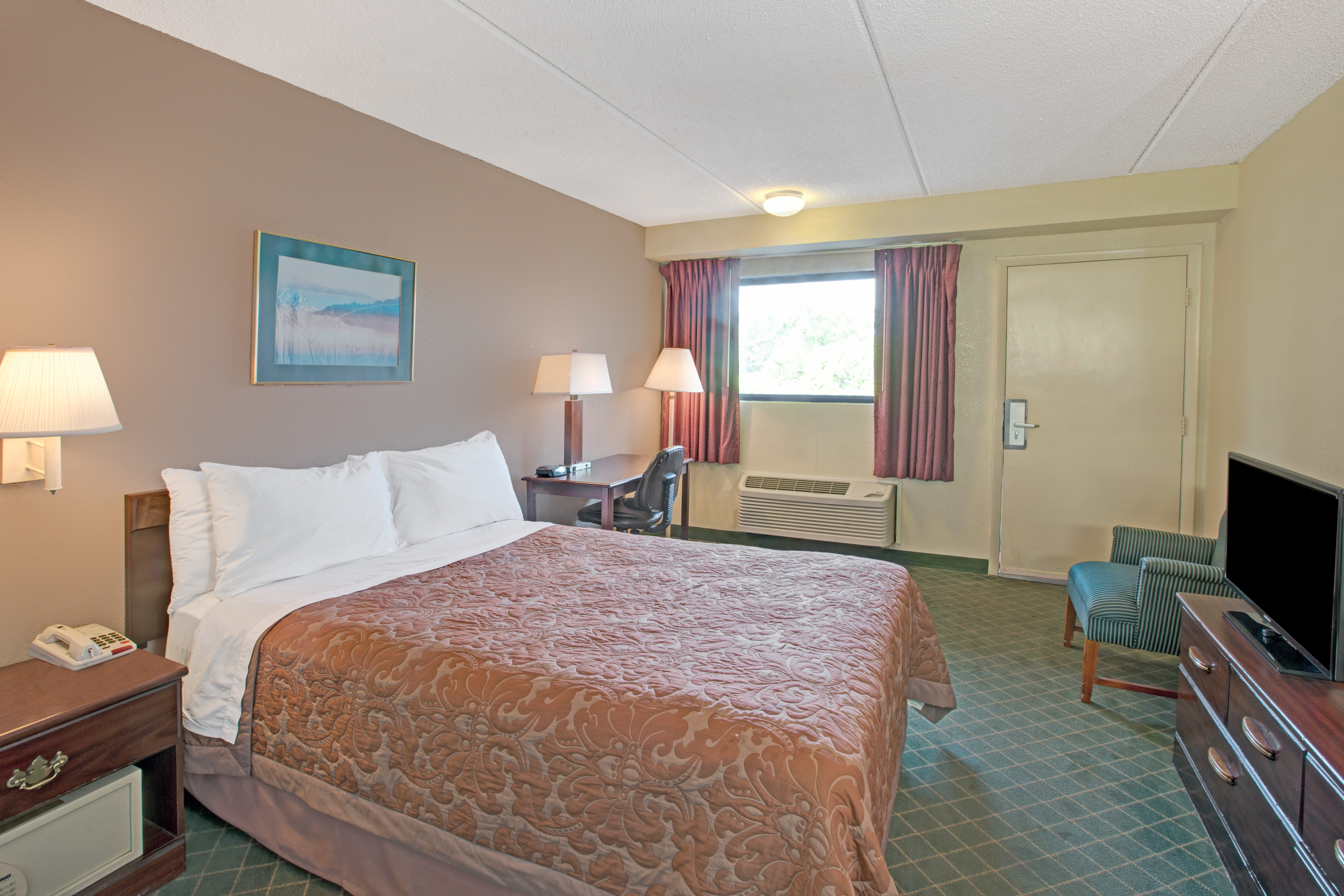 Guest room at the Super 8 by Wyndham Shelby in Shelby, North Carolina