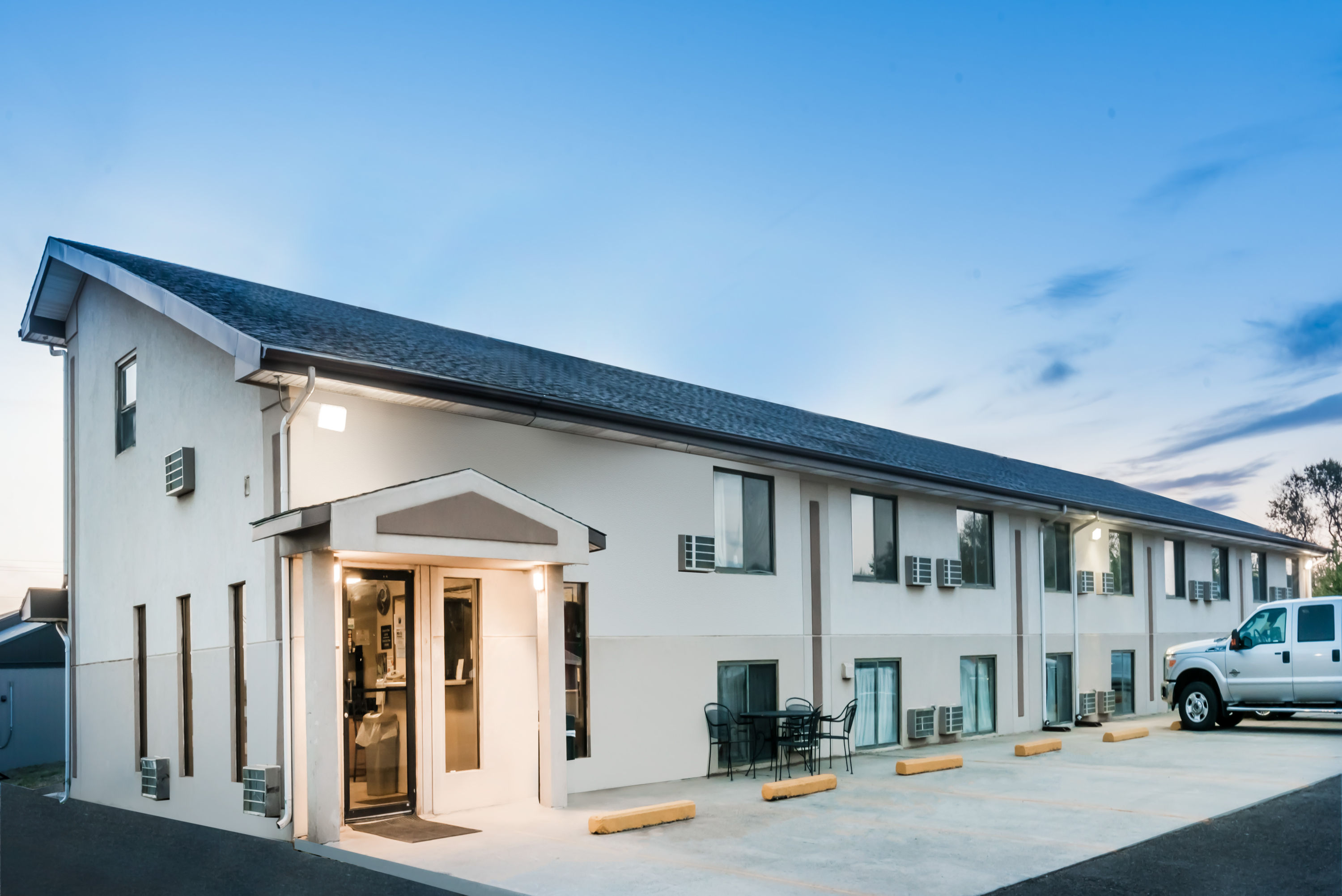 Exterior Dusk Image of Super 8 by Wyndham Bowman hotel in Bowman, North Dakota