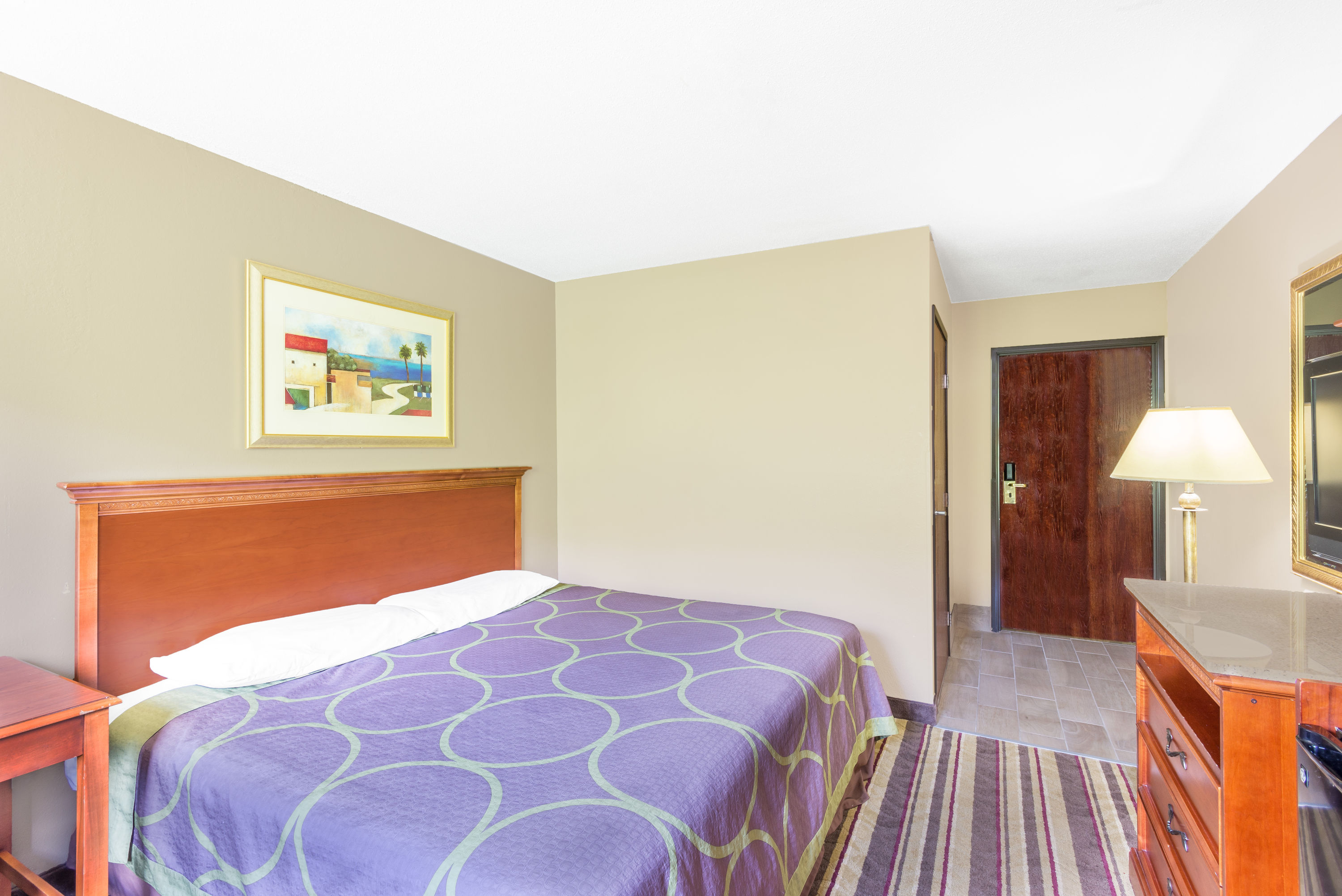 Guest room at the Super 8 by Wyndham Tilton/Lake Winnipesaukee in Tilton, New Hampshire