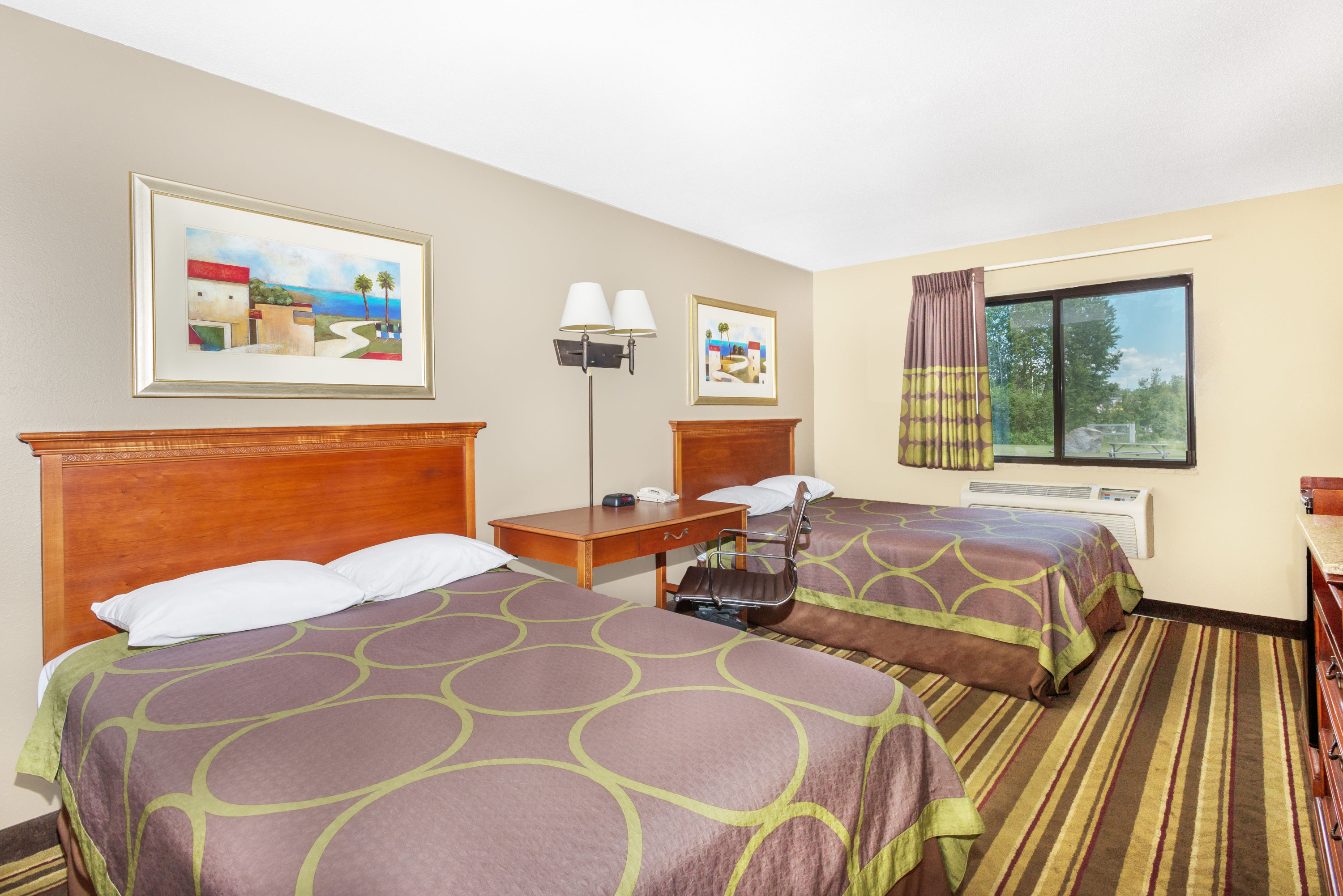 Guest room at the Super 8 by Wyndham Tilton/Lake Winnipesaukee in Tilton, New Hampshire