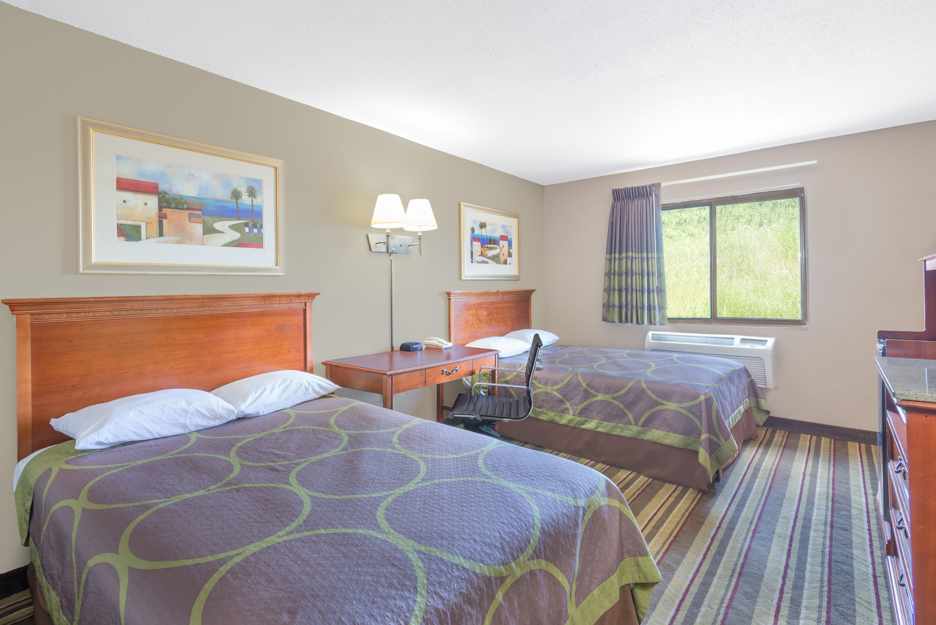 Guest room at the Super 8 by Wyndham Tilton/Lake Winnipesaukee in Tilton, New Hampshire