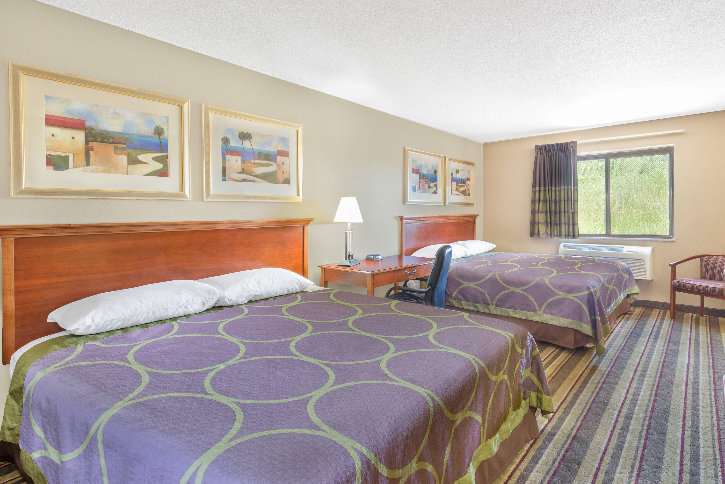 Guest room at the Super 8 by Wyndham Tilton/Lake Winnipesaukee in Tilton, New Hampshire