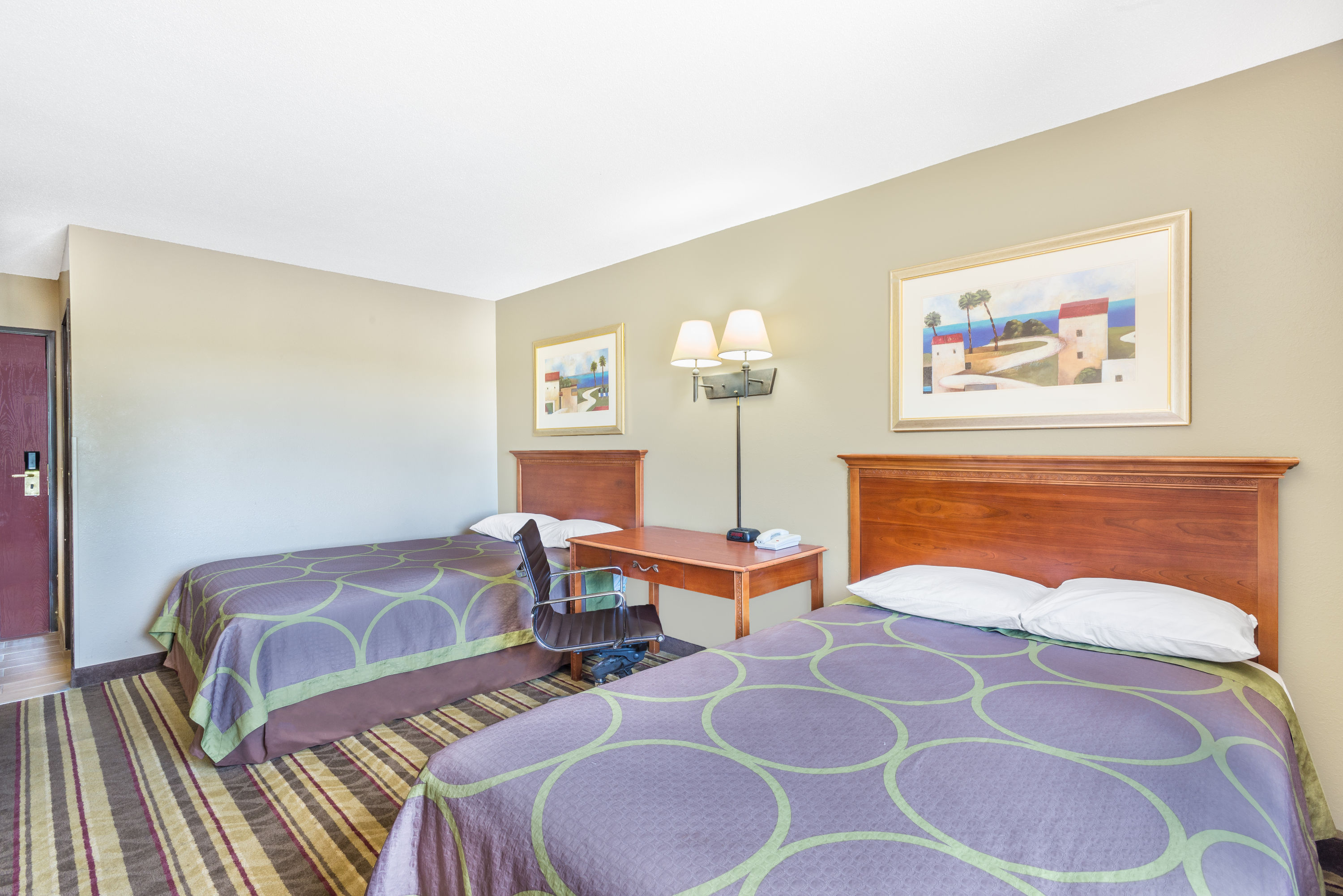 Guest room at the Super 8 by Wyndham Tilton/Lake Winnipesaukee in Tilton, New Hampshire