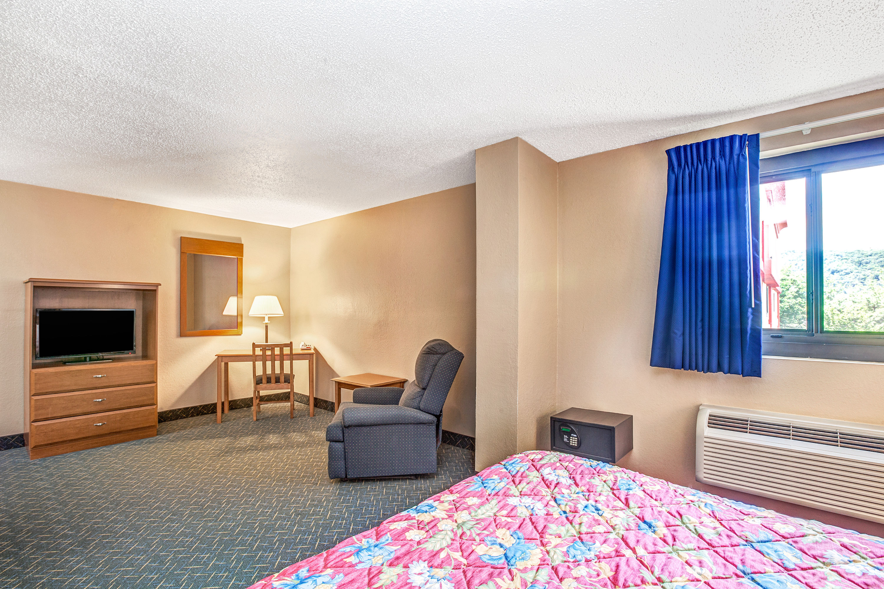 Guest room at the Super 8 by Wyndham Mahwah in Mahwah, New Jersey