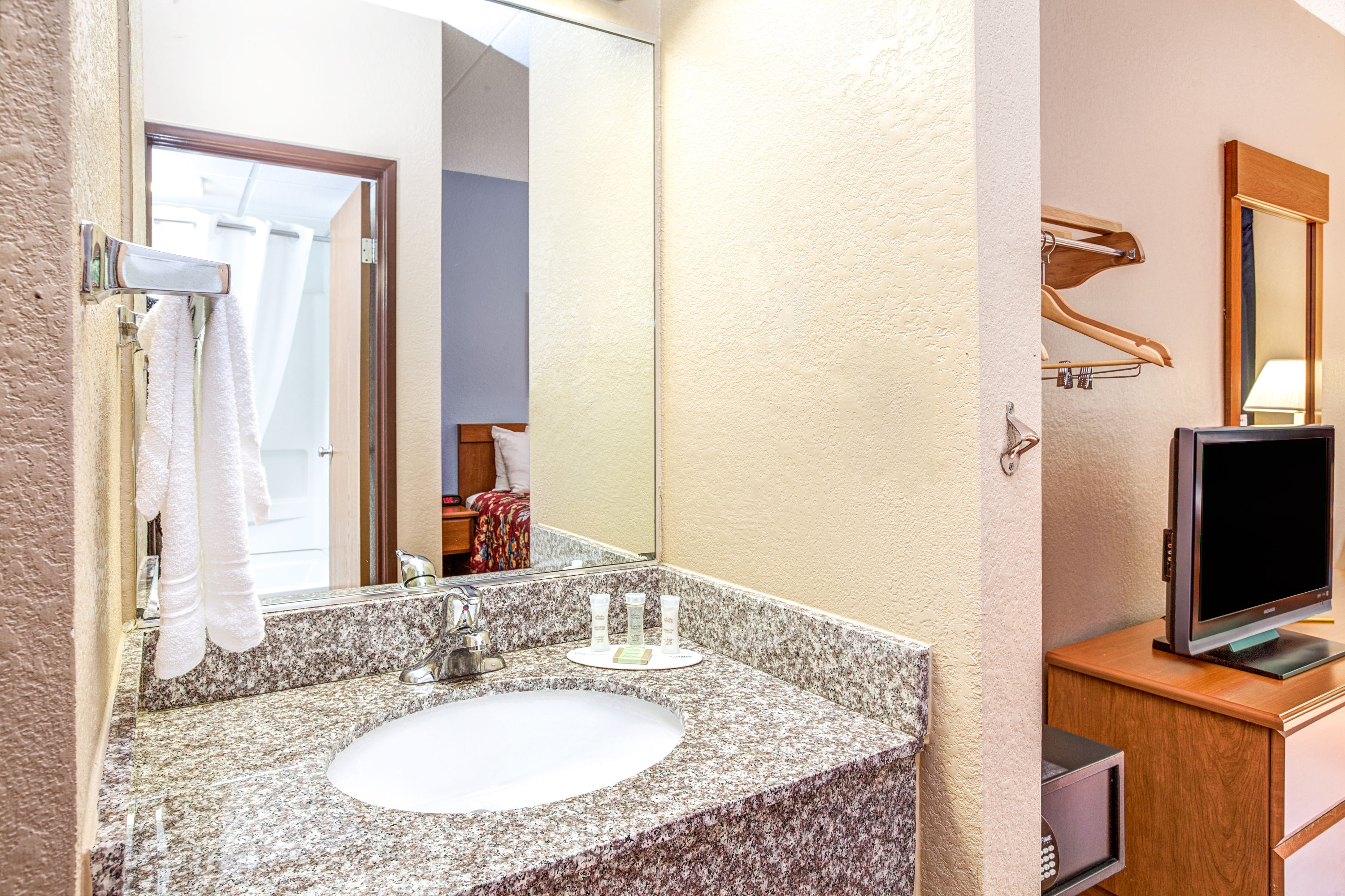 Guest room at the Super 8 by Wyndham Mahwah in Mahwah, New Jersey