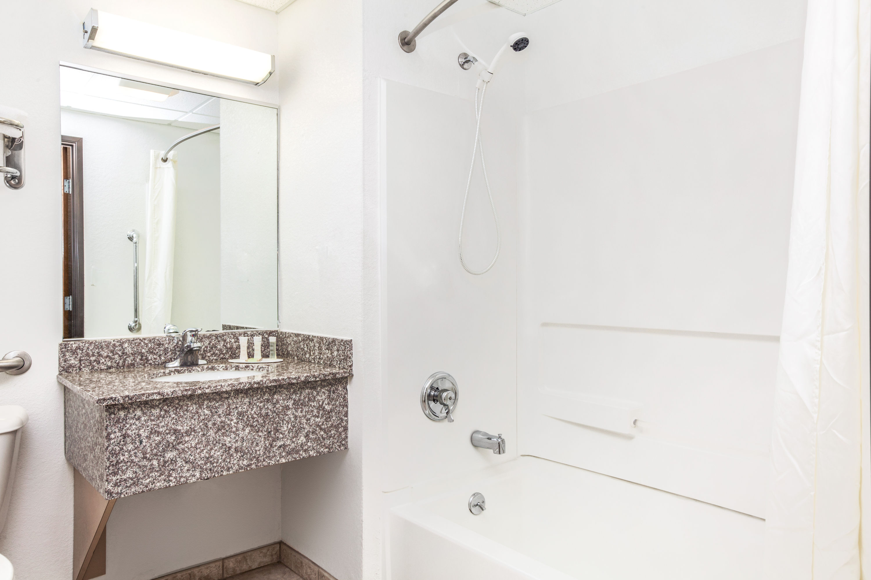 Guest room at the Super 8 by Wyndham Mahwah in Mahwah, New Jersey