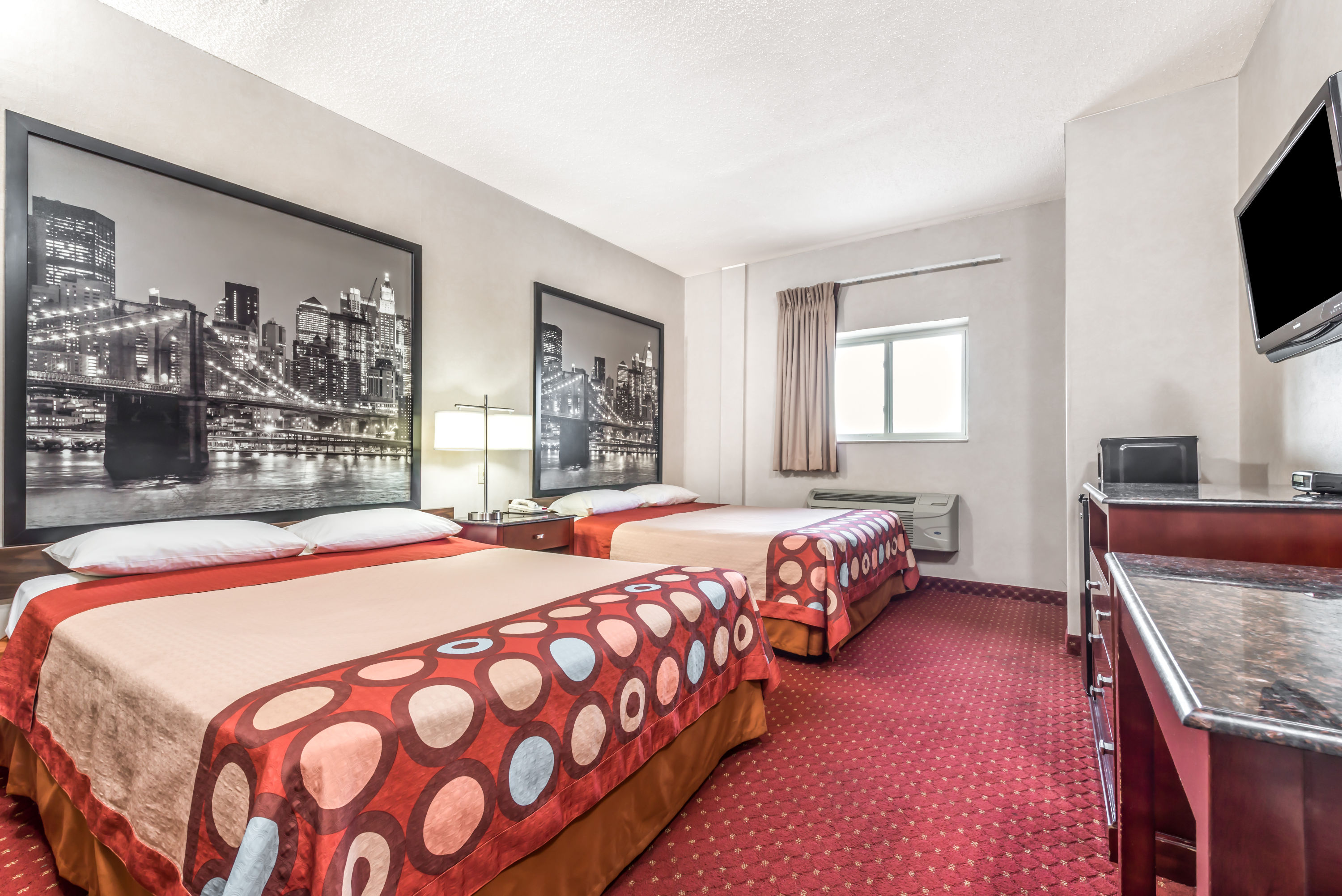 Guest room at the Super 8 by Wyndham North Bergen NJ/NYC Area in North Bergen, New Jersey