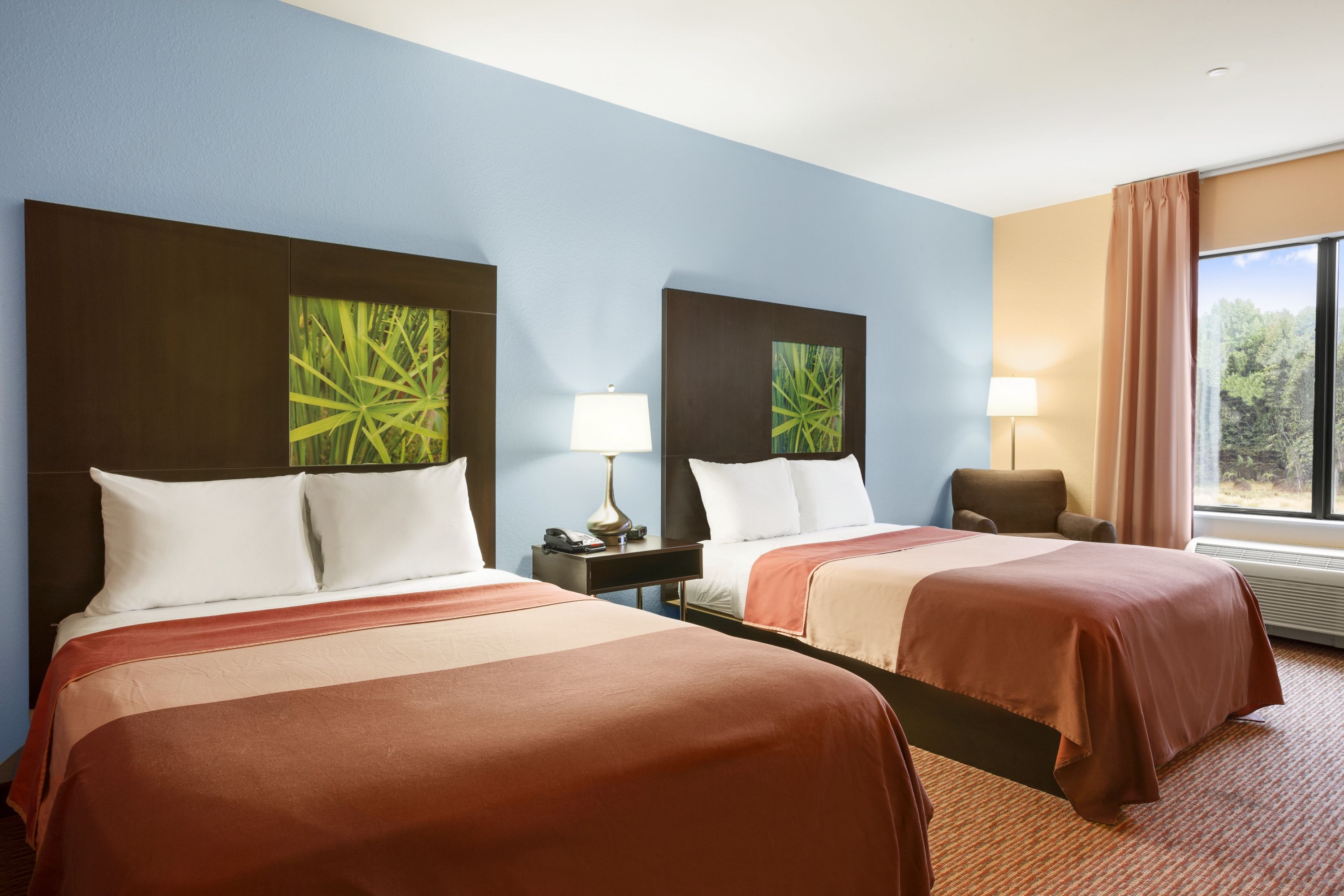 Guest room at the Super 8 by Wyndham Pennsville/Wilmington in Pennsville, New Jersey