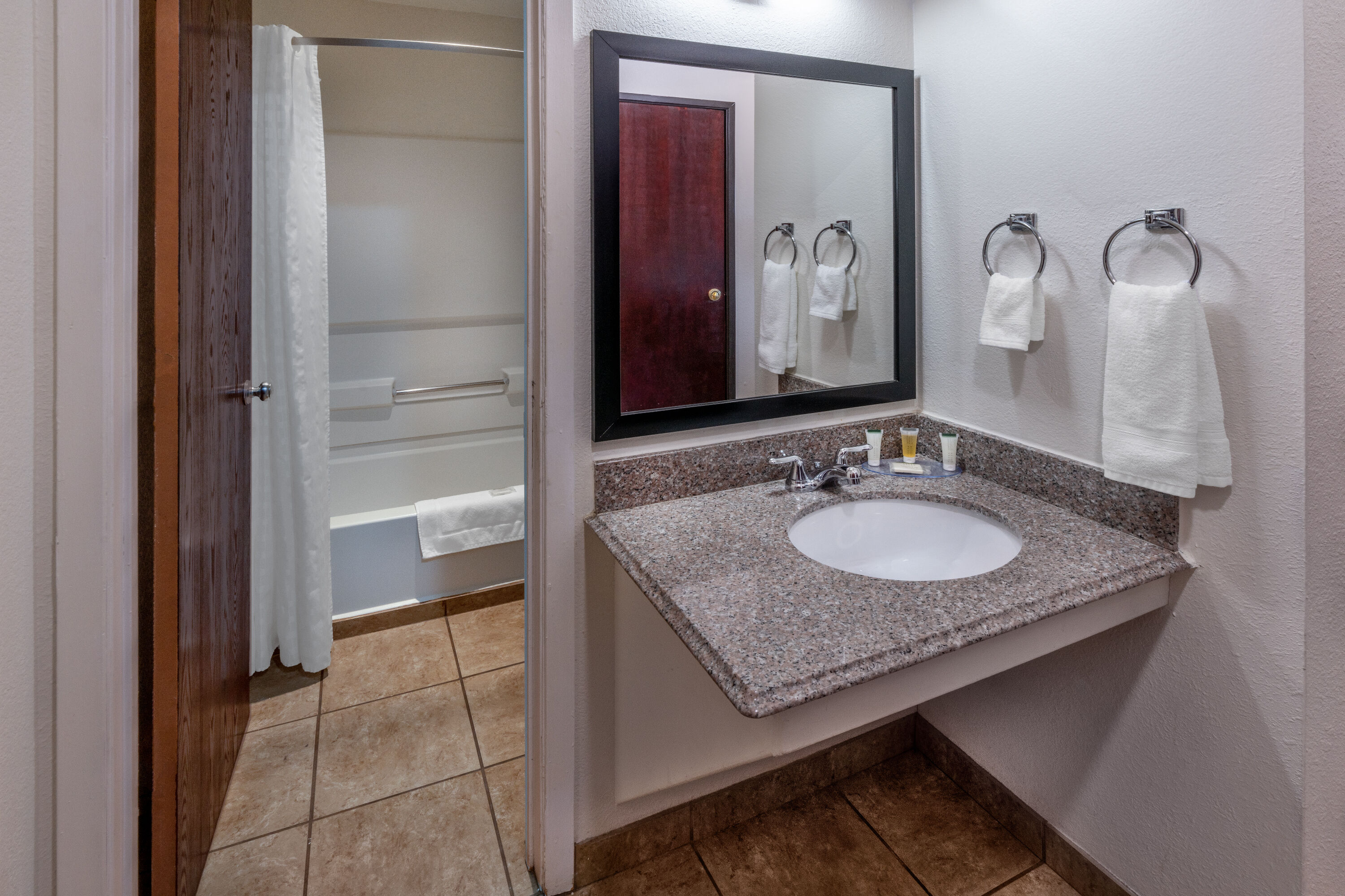 Guest room bath at the Super 8 by Wyndham Clayton in Clayton, New Mexico
