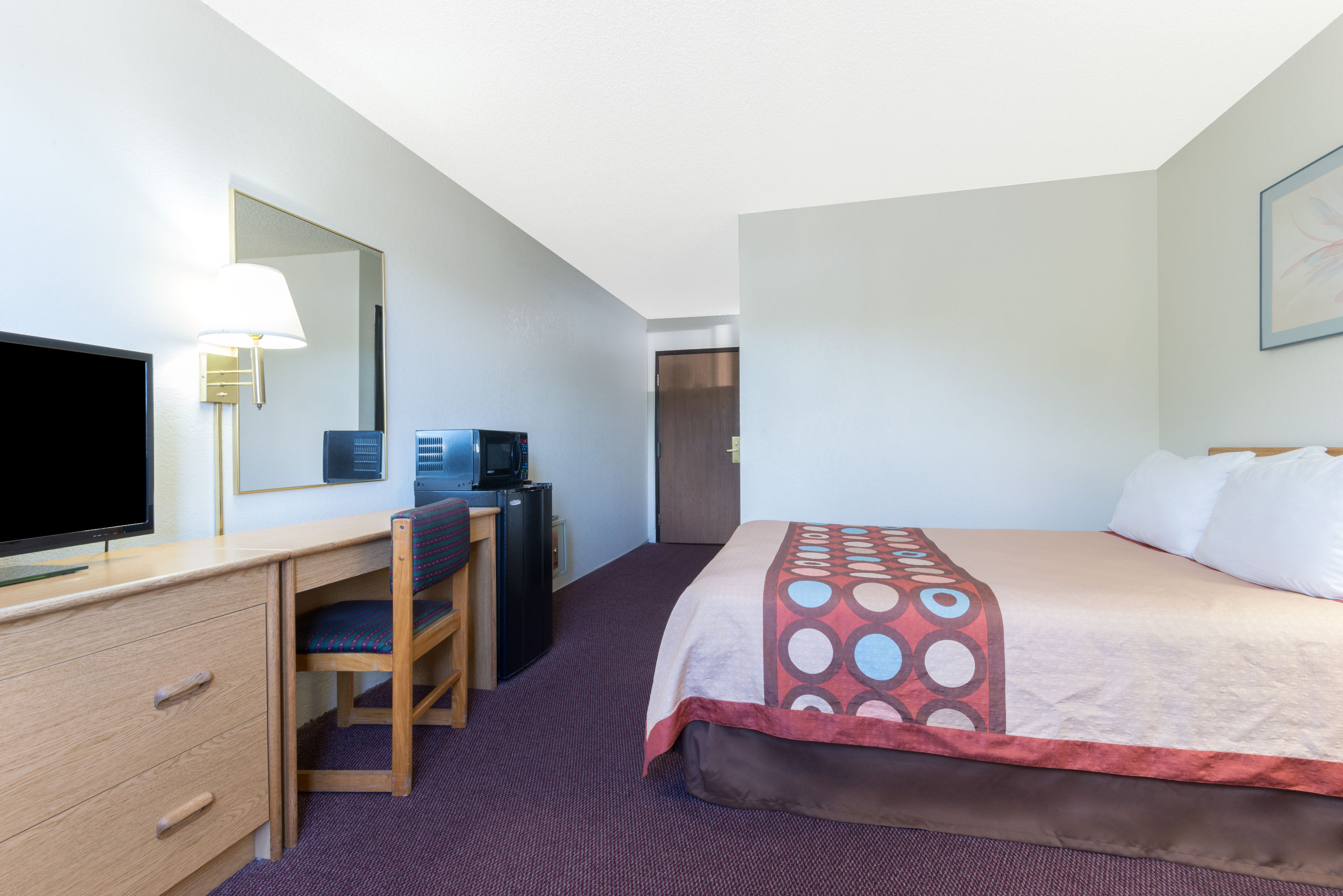 Guest room at the Super 8 by Wyndham Raton in Raton, New Mexico