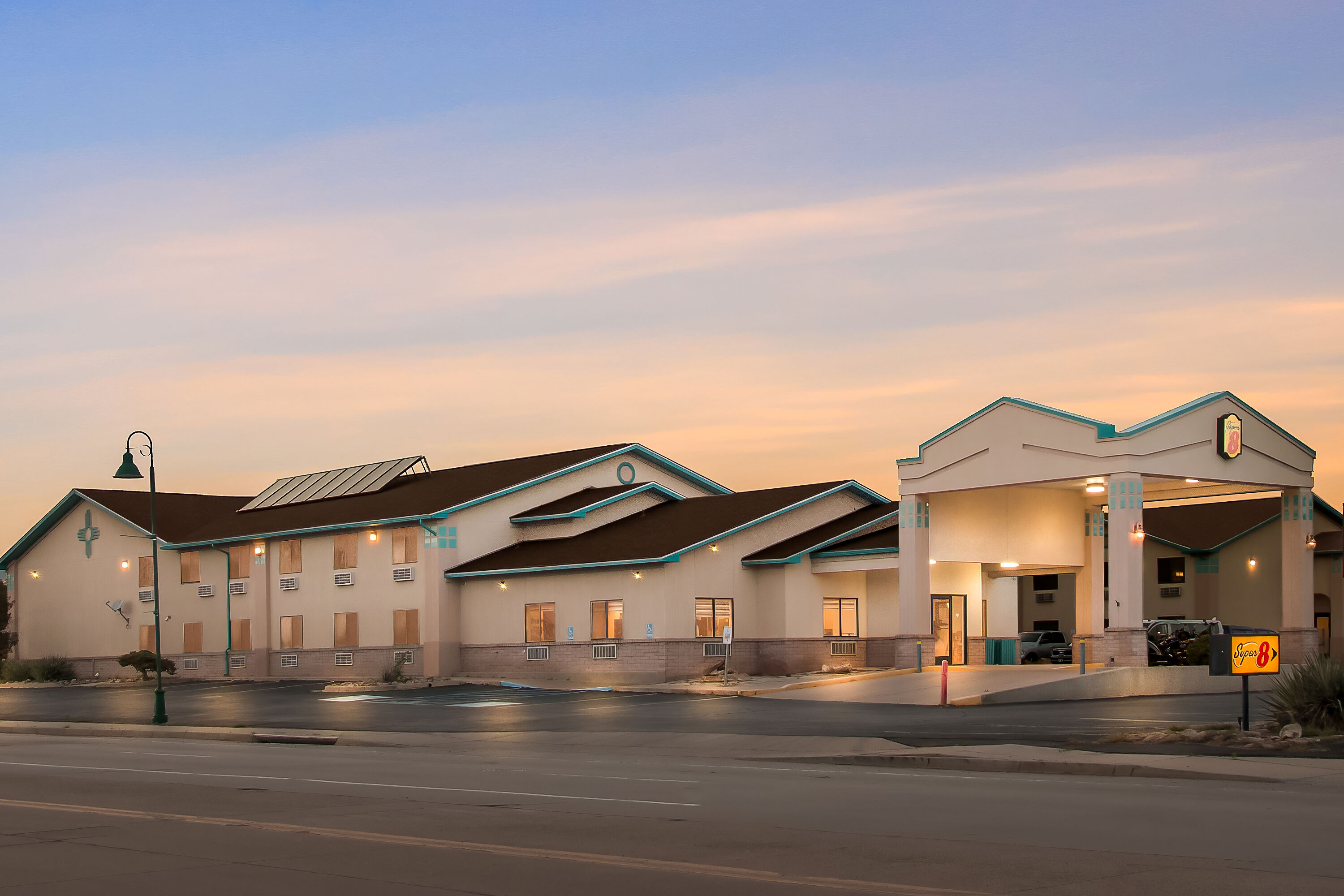 Exterior Night Image of Super 8 by Wyndham Santa Rosa hotel in Santa Rosa, New Mexico