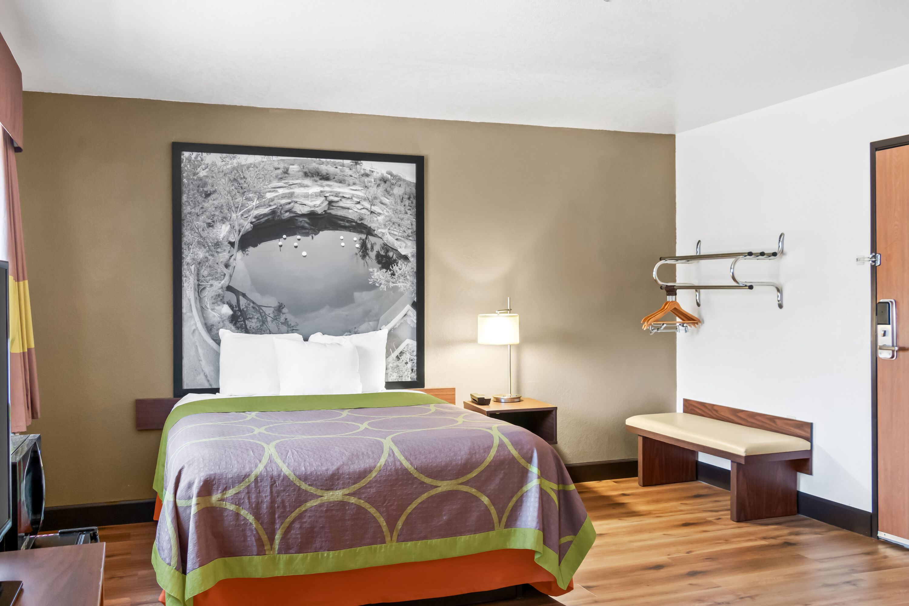 King bed guest room at the Super 8 by Wyndham Santa Rosa in Santa Rosa, New Mexico