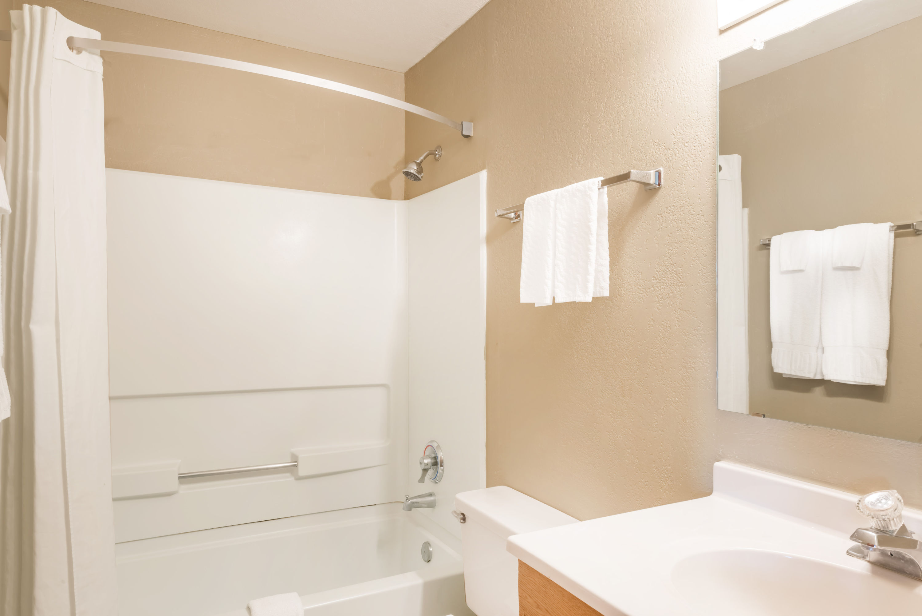 Guest room bath at the Super 8 by Wyndham Socorro in Socorro, New Mexico