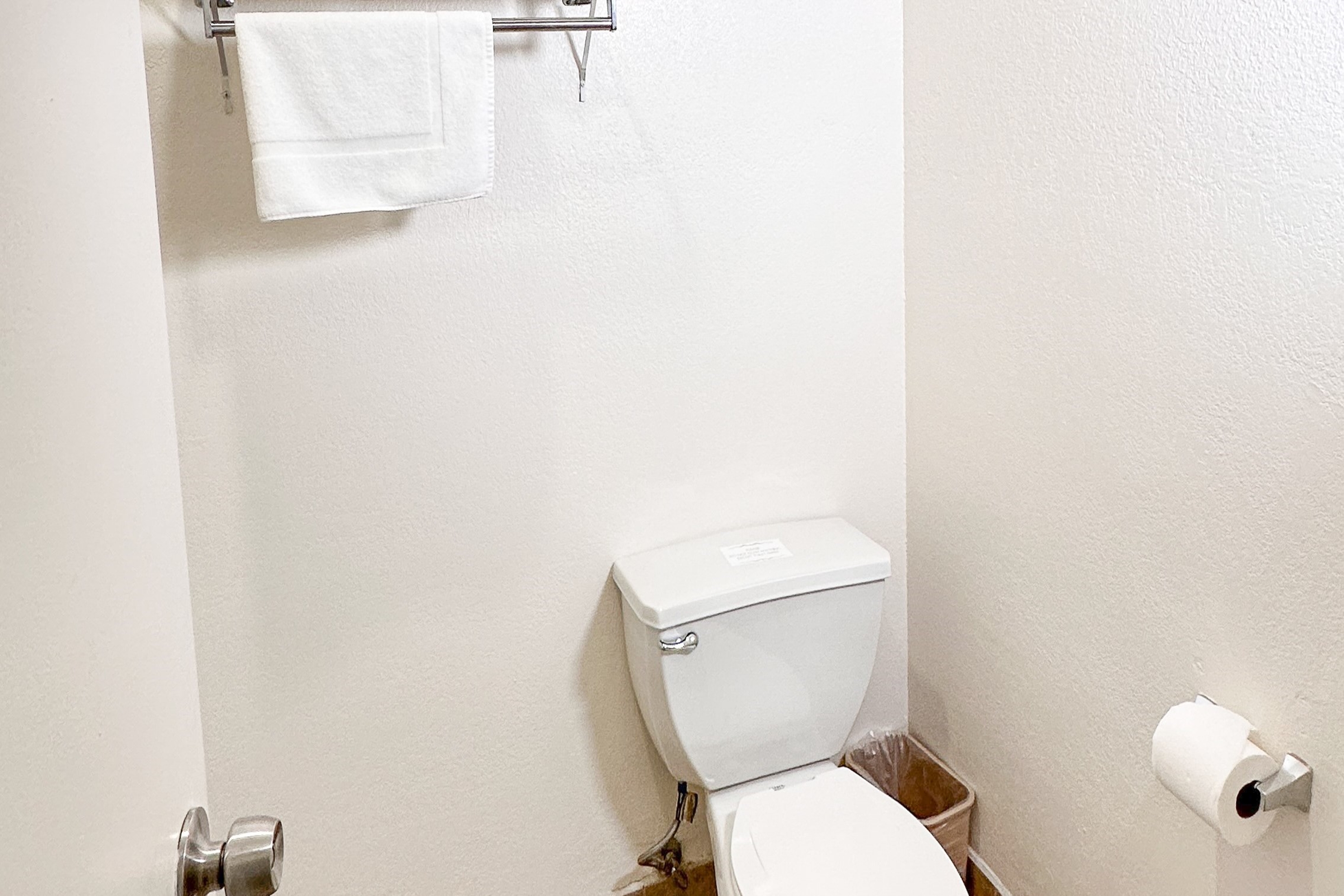 Guest room bath at the Super 8 by Wyndham Las Vegas North Strip/Fremont St. Area in Las Vegas, Nevada