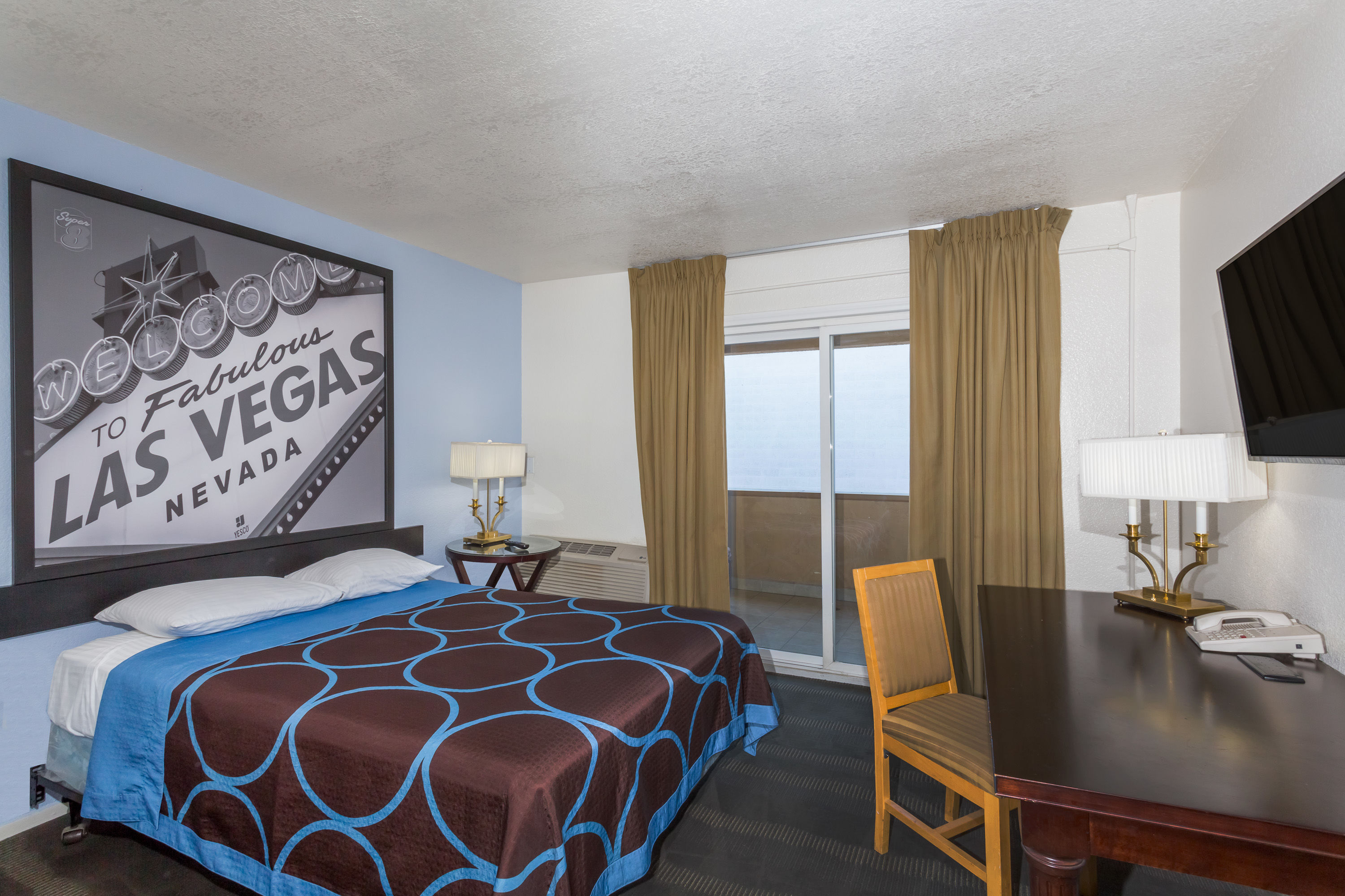 Guest room at the Super 8 by Wyndham Las Vegas North Strip/Fremont St. Area in Las Vegas, Nevada