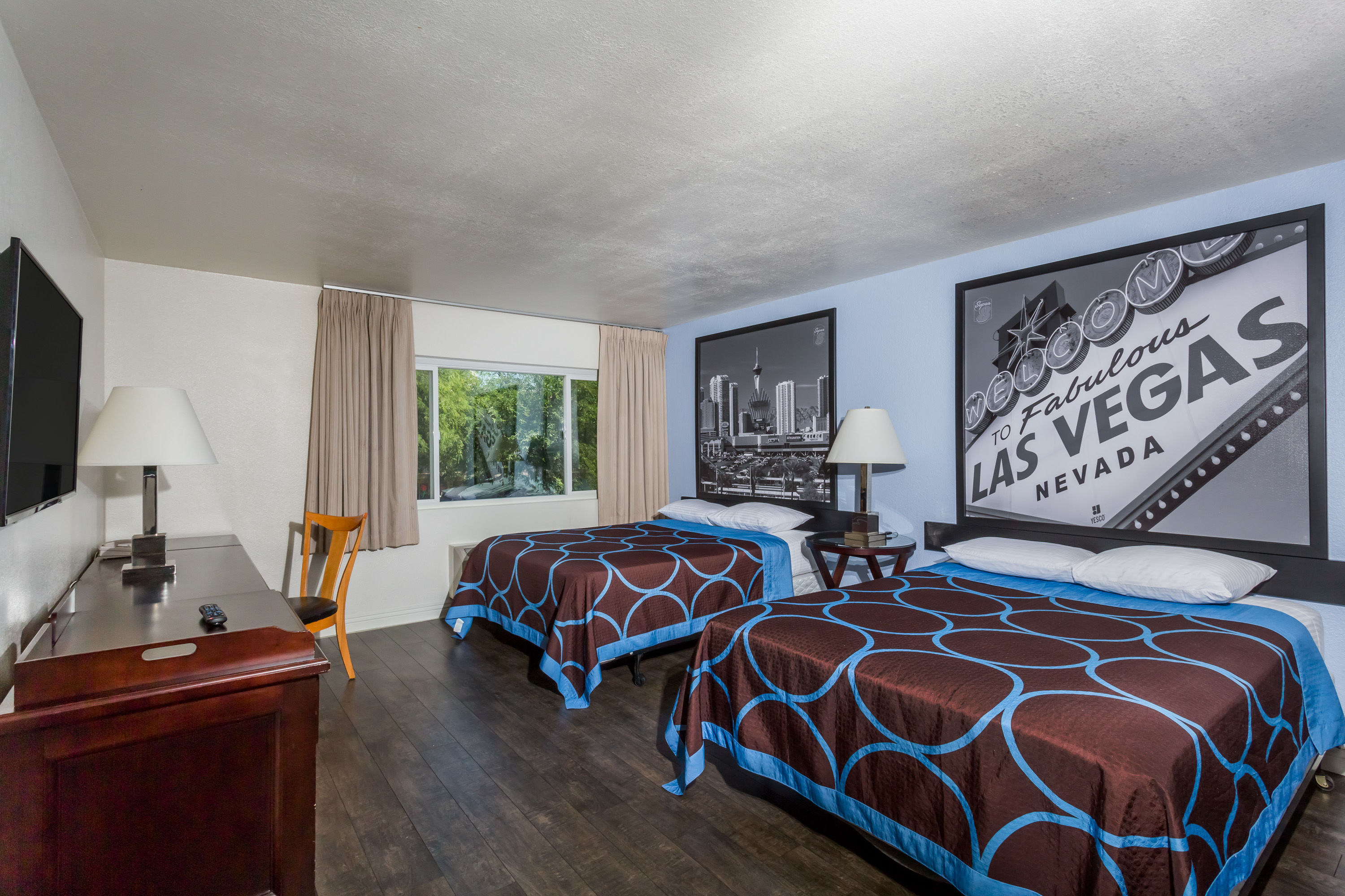 Guest room at the Super 8 by Wyndham Las Vegas North Strip/Fremont St. Area in Las Vegas, Nevada