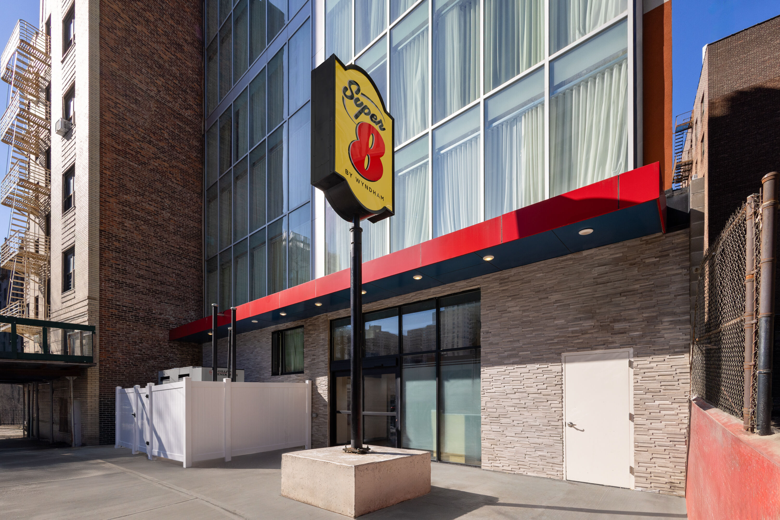 Exterior Day Image of Super 8 by Wyndham Bronx Near Stadium hotel in Bronx, New York