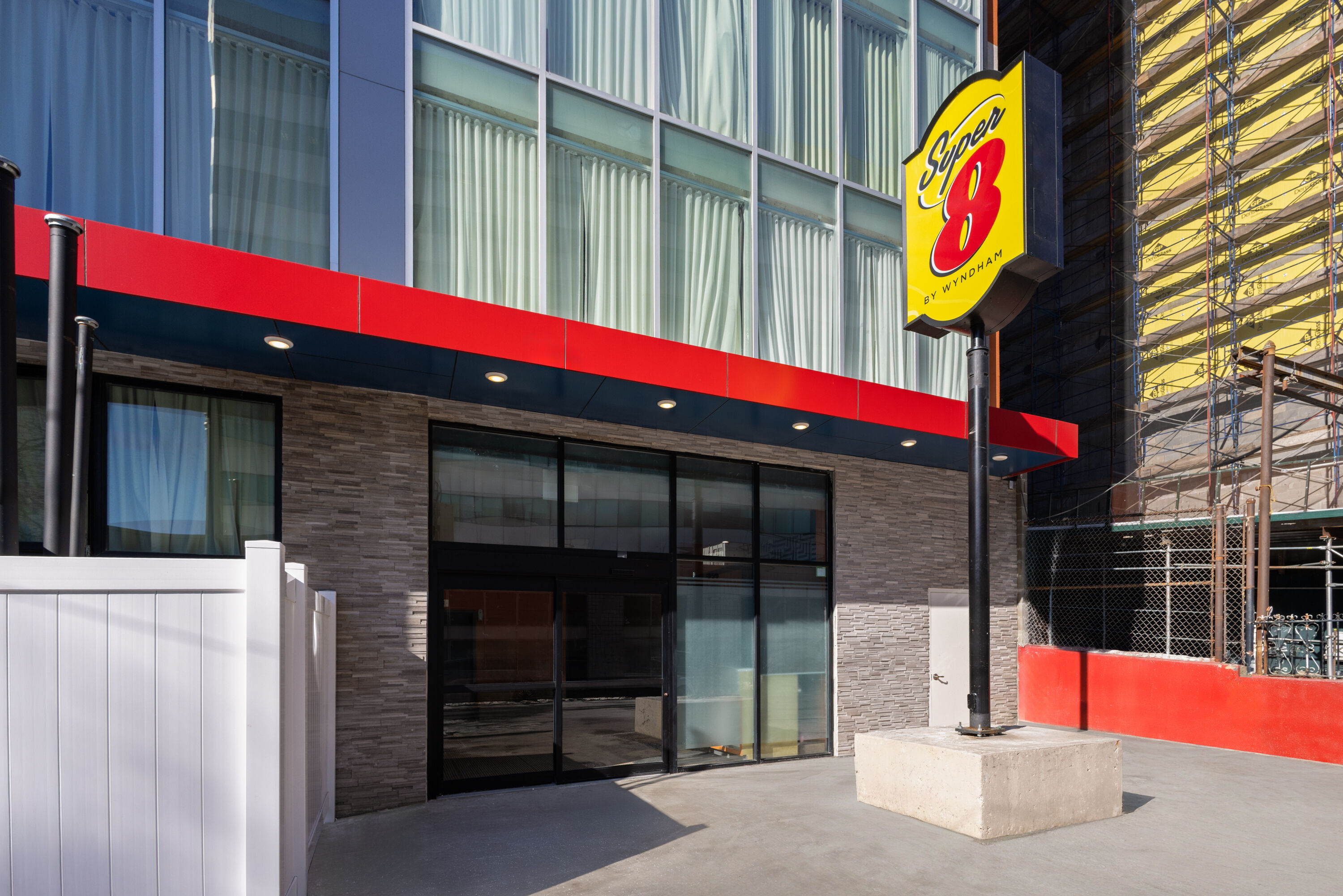 Exterior Day Image of Super 8 by Wyndham Bronx Near Stadium hotel in Bronx, New York