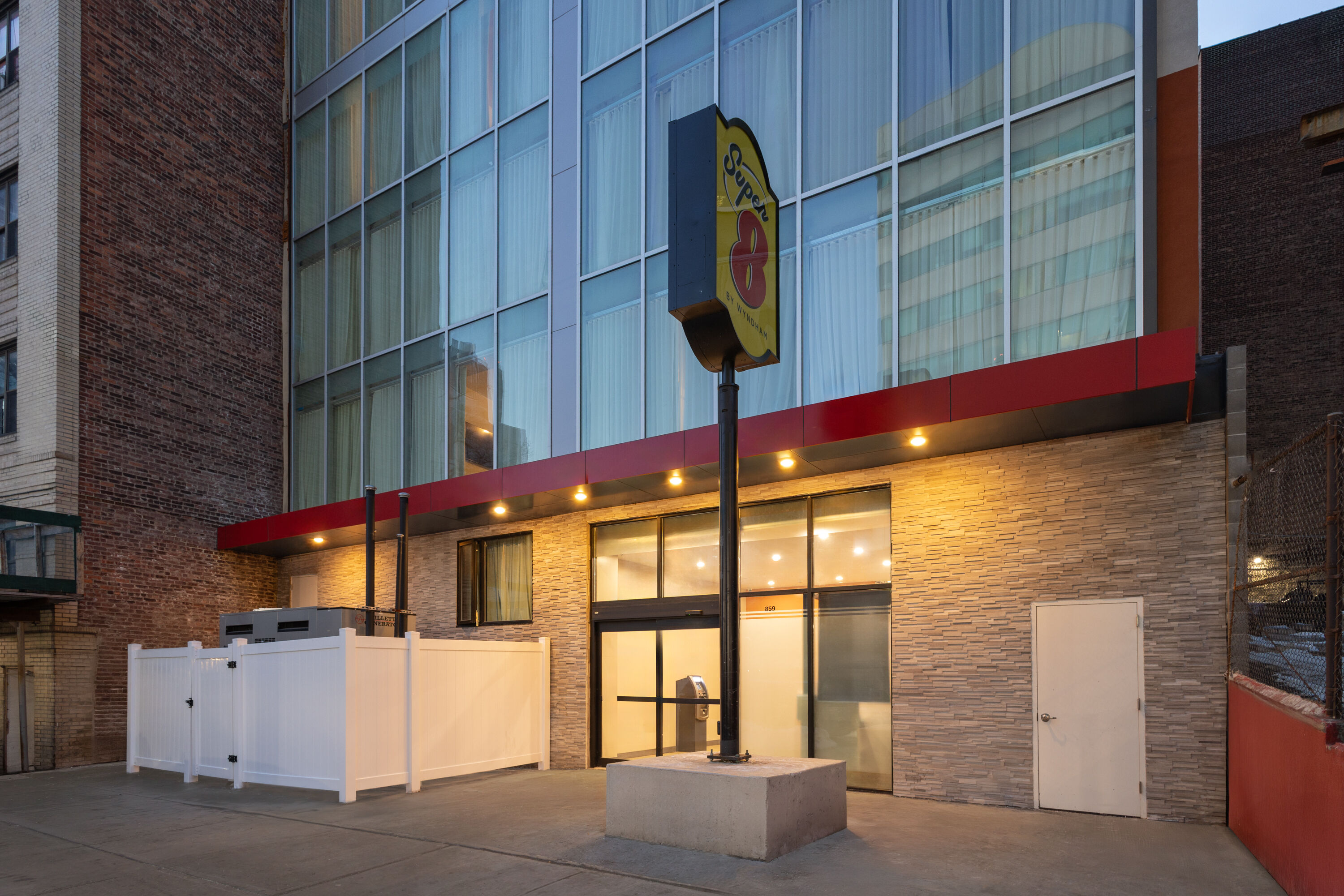 Exterior Dusk Image of Super 8 by Wyndham Bronx Near Stadium hotel in Bronx, New York