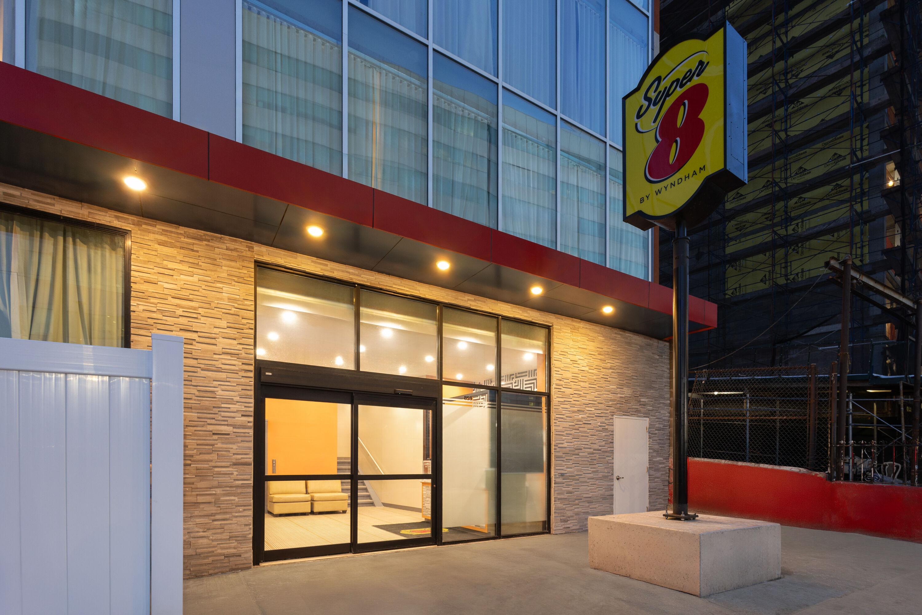 Exterior Dusk Image of Super 8 by Wyndham Bronx Near Stadium hotel in Bronx, New York
