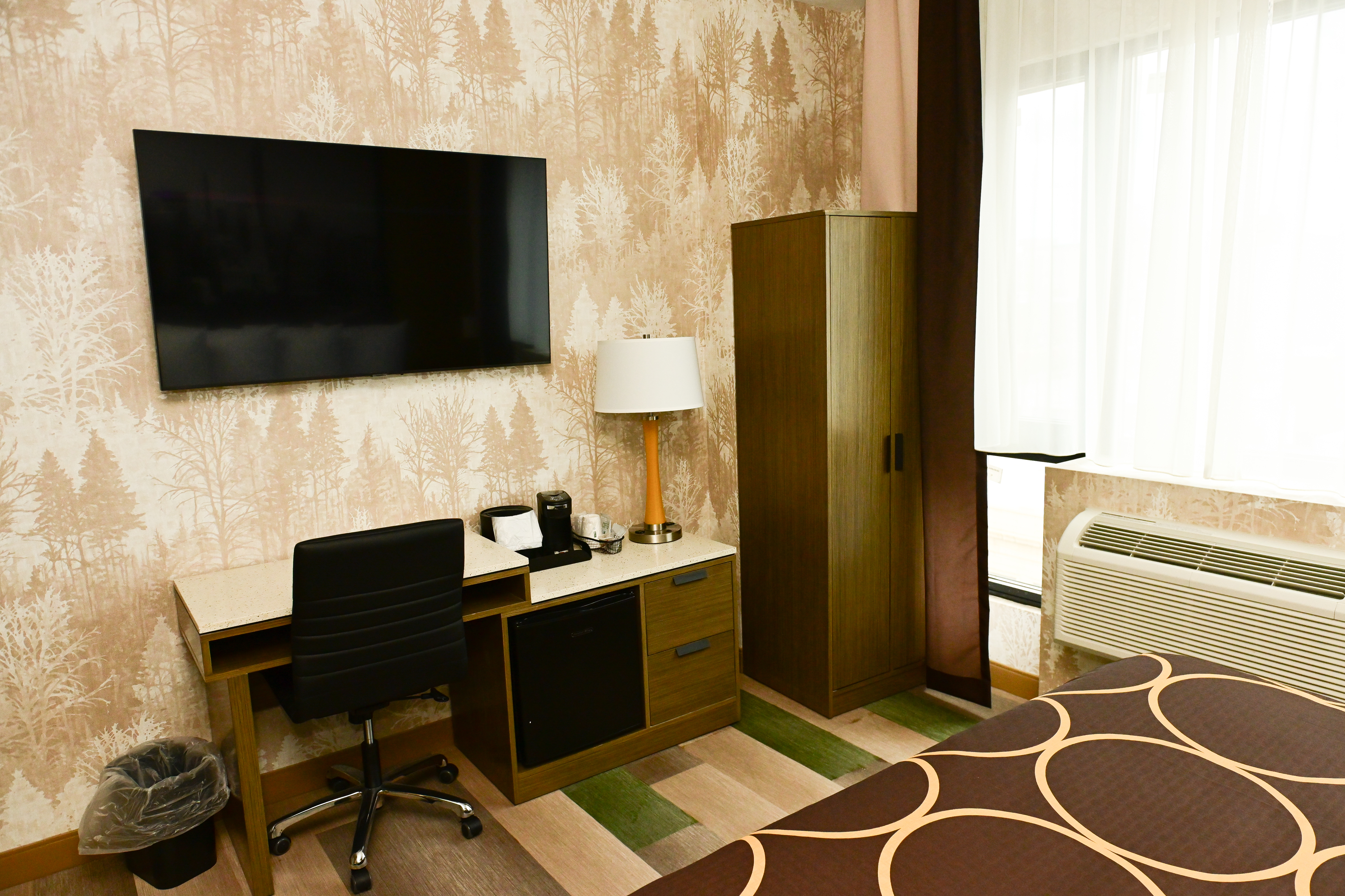 Guest room at the Super 8 by Wyndham Bronx Near Botanical Garden in Bronx, New York