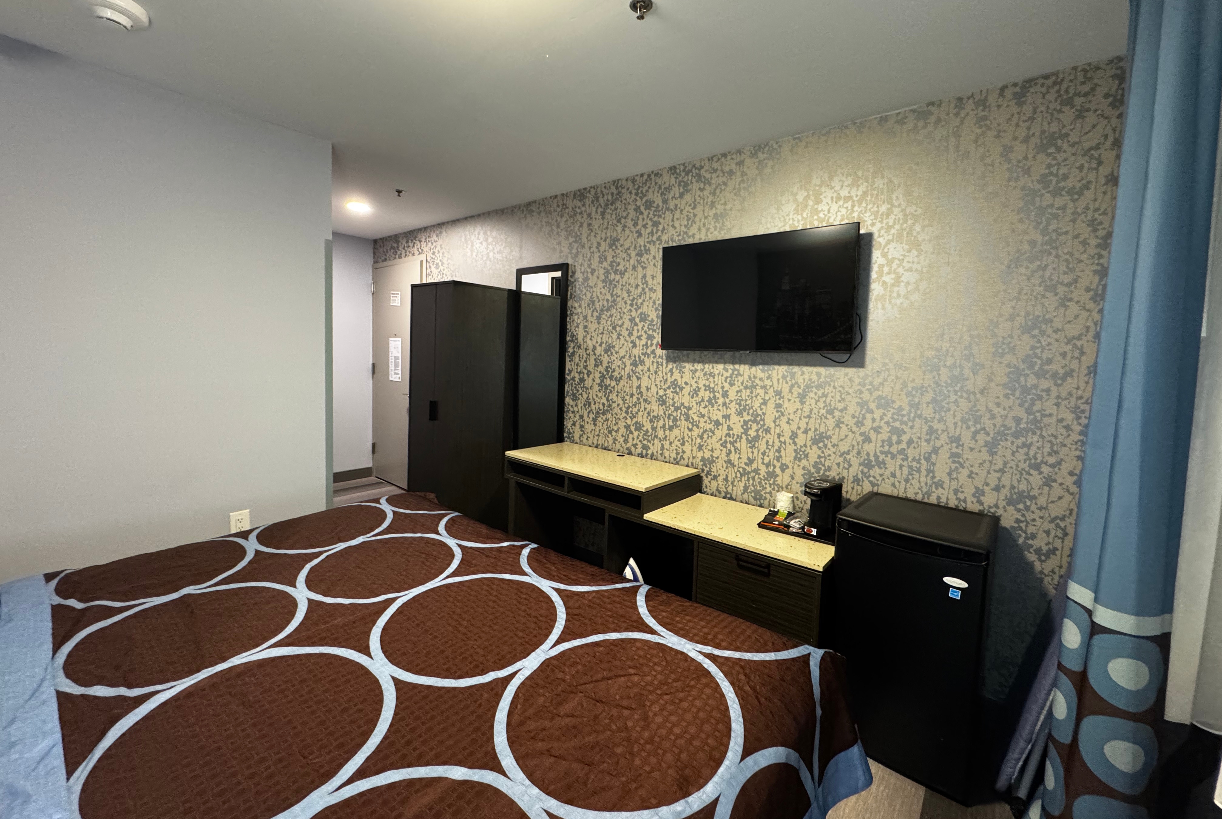 Guest room at the Super 8 by Wyndham Brooklyn Fulton Street/Broadway Junction in Brooklyn, New York