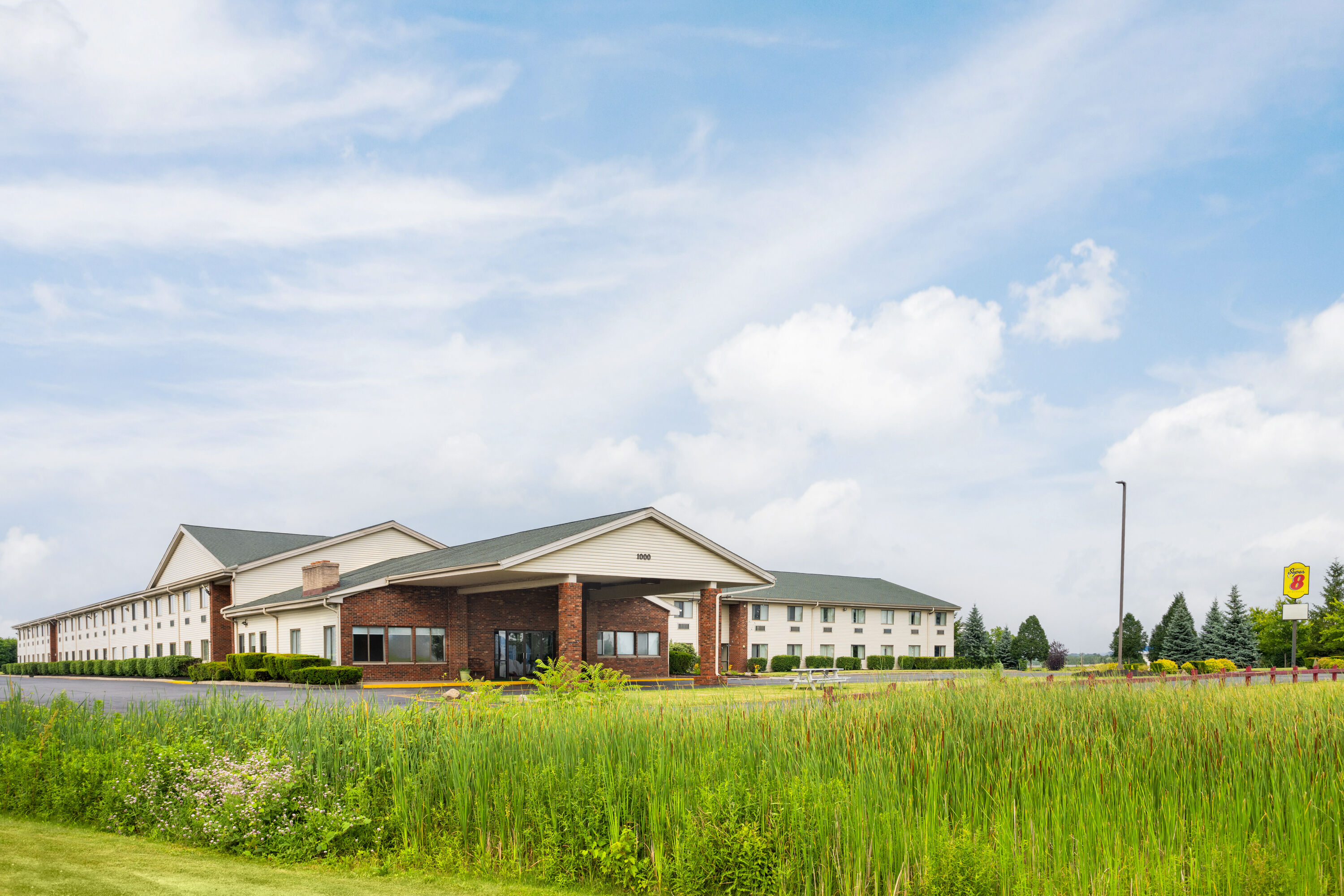 Exterior Day Image of Super 8 by Wyndham Henrietta/Rochester Area hotel in Henrietta, New York
