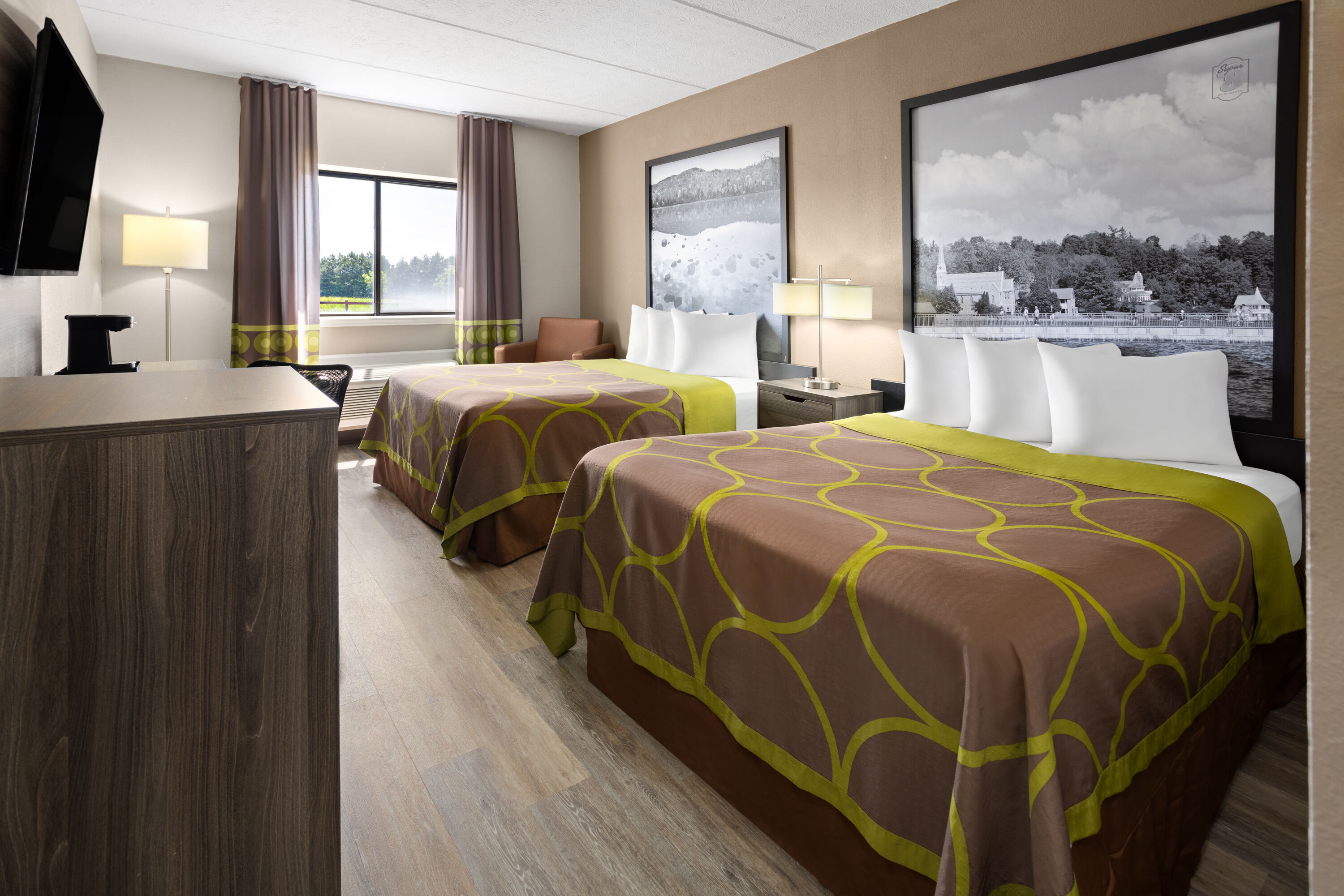 Guest room at the Super 8 by Wyndham Henrietta/Rochester Area in Henrietta, New York