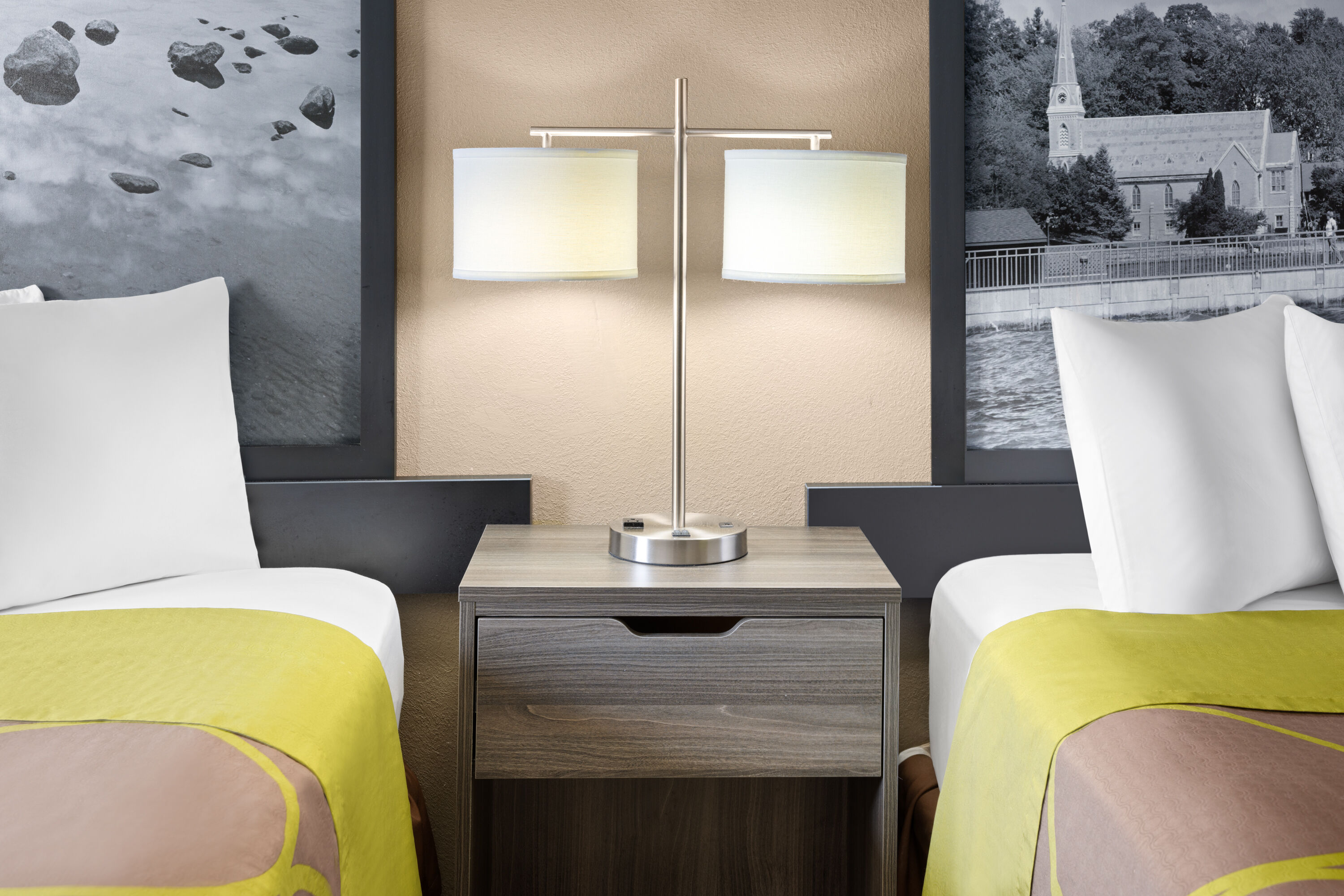 Guest room at the Super 8 by Wyndham Henrietta/Rochester Area in Henrietta, New York