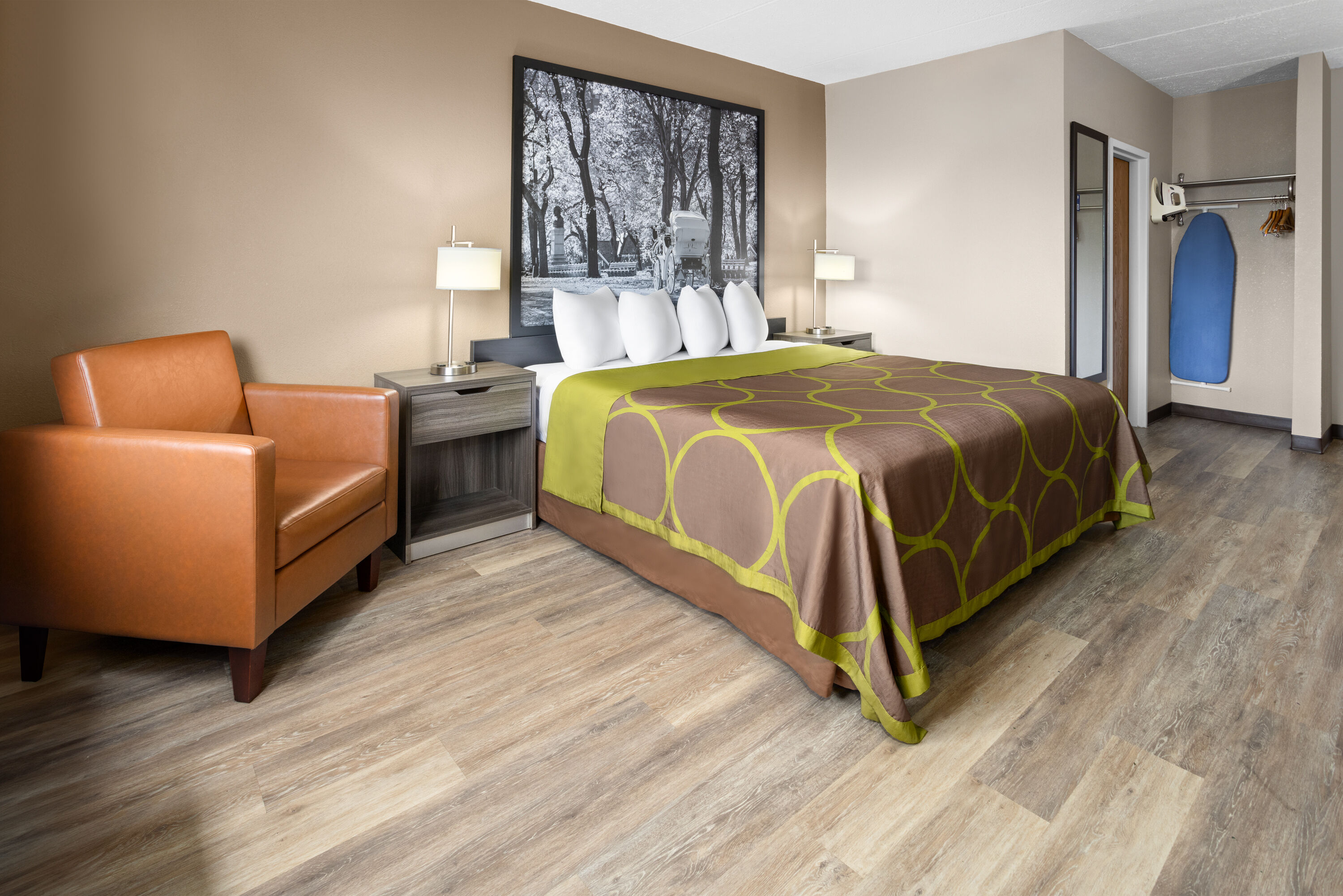 Guest room at the Super 8 by Wyndham Henrietta/Rochester Area in Henrietta, New York